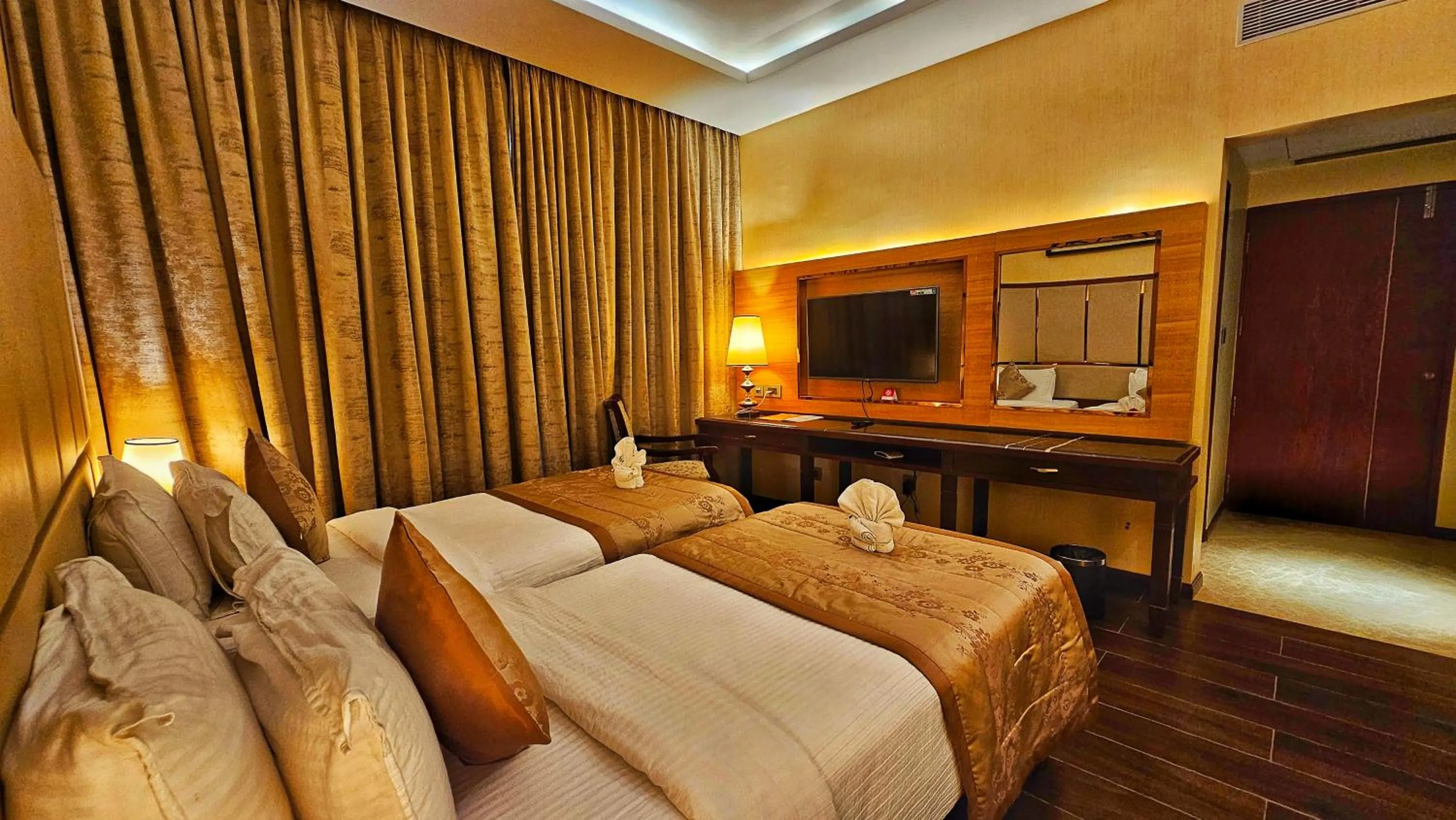 Bed in UVA Meridian Bay Resort & Spa