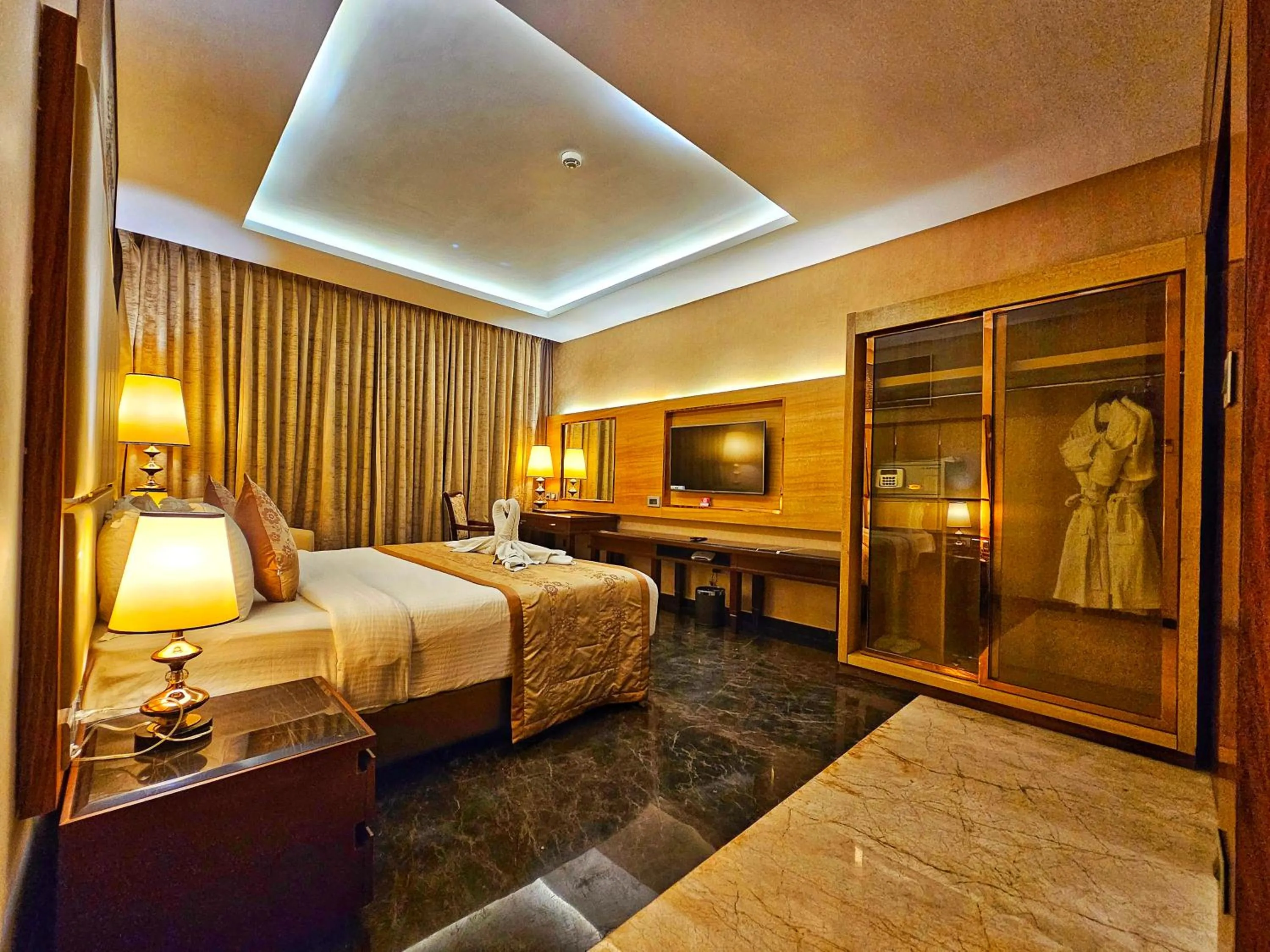 Bed in UVA Meridian Bay Resort & Spa