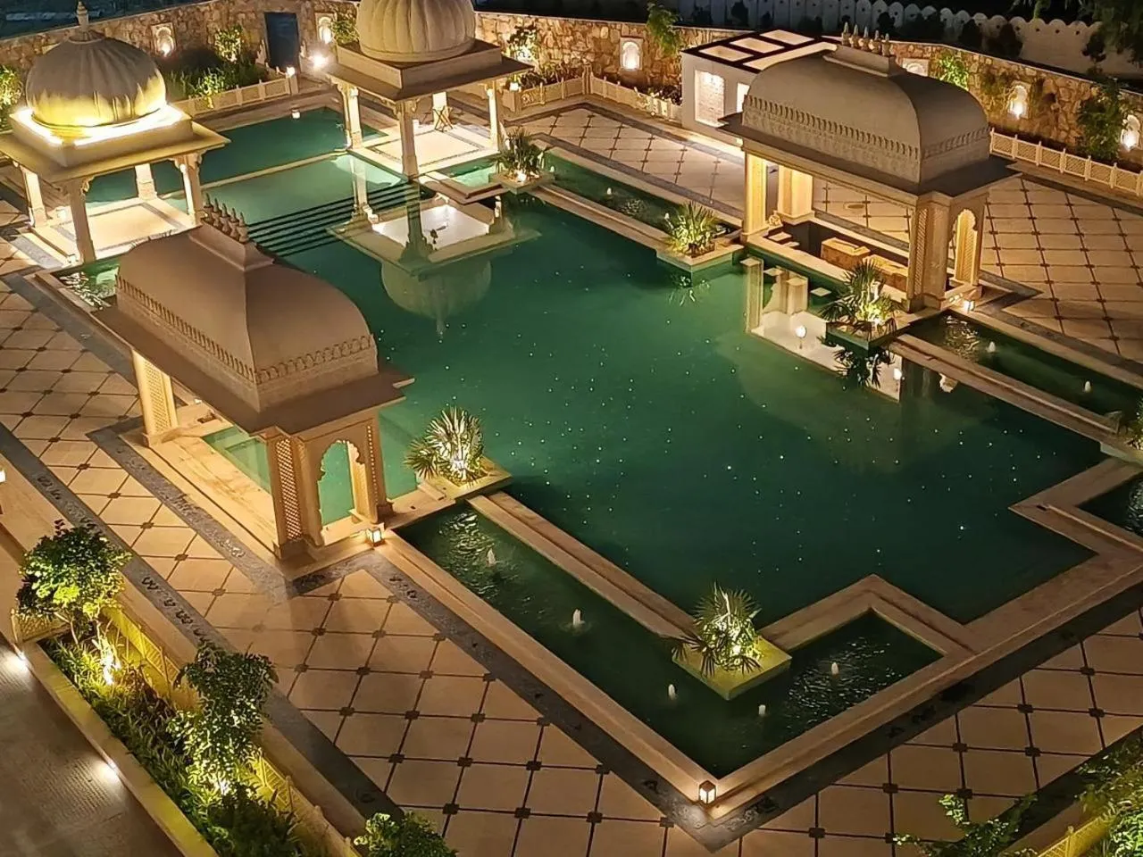 Swimming pool in Wyndham Grand Udaipur Fateh Sagar Lake - Pure Vegetarian Resort