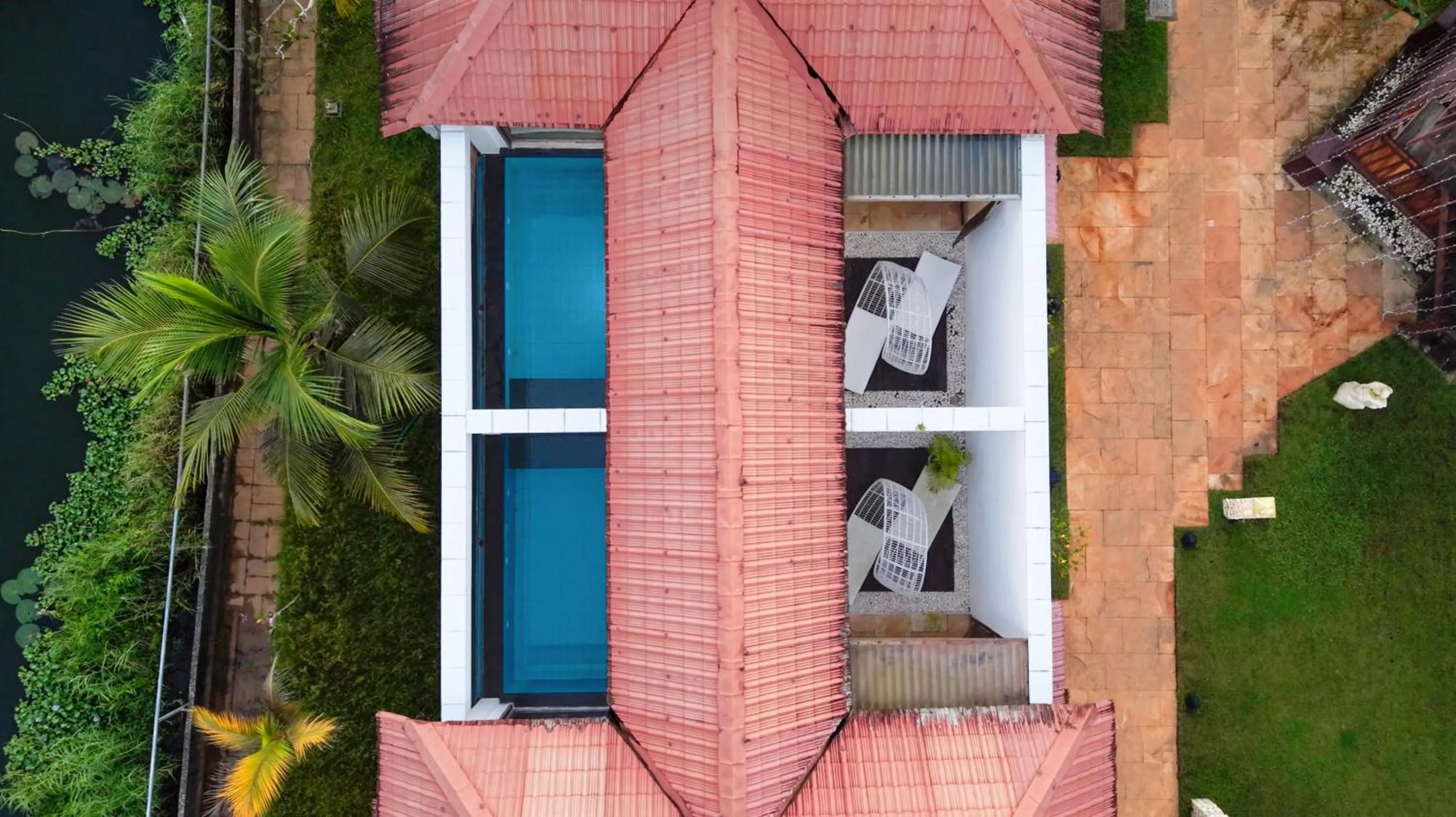 Swimming pool in Alaya Stays Paloma Backwater Resort