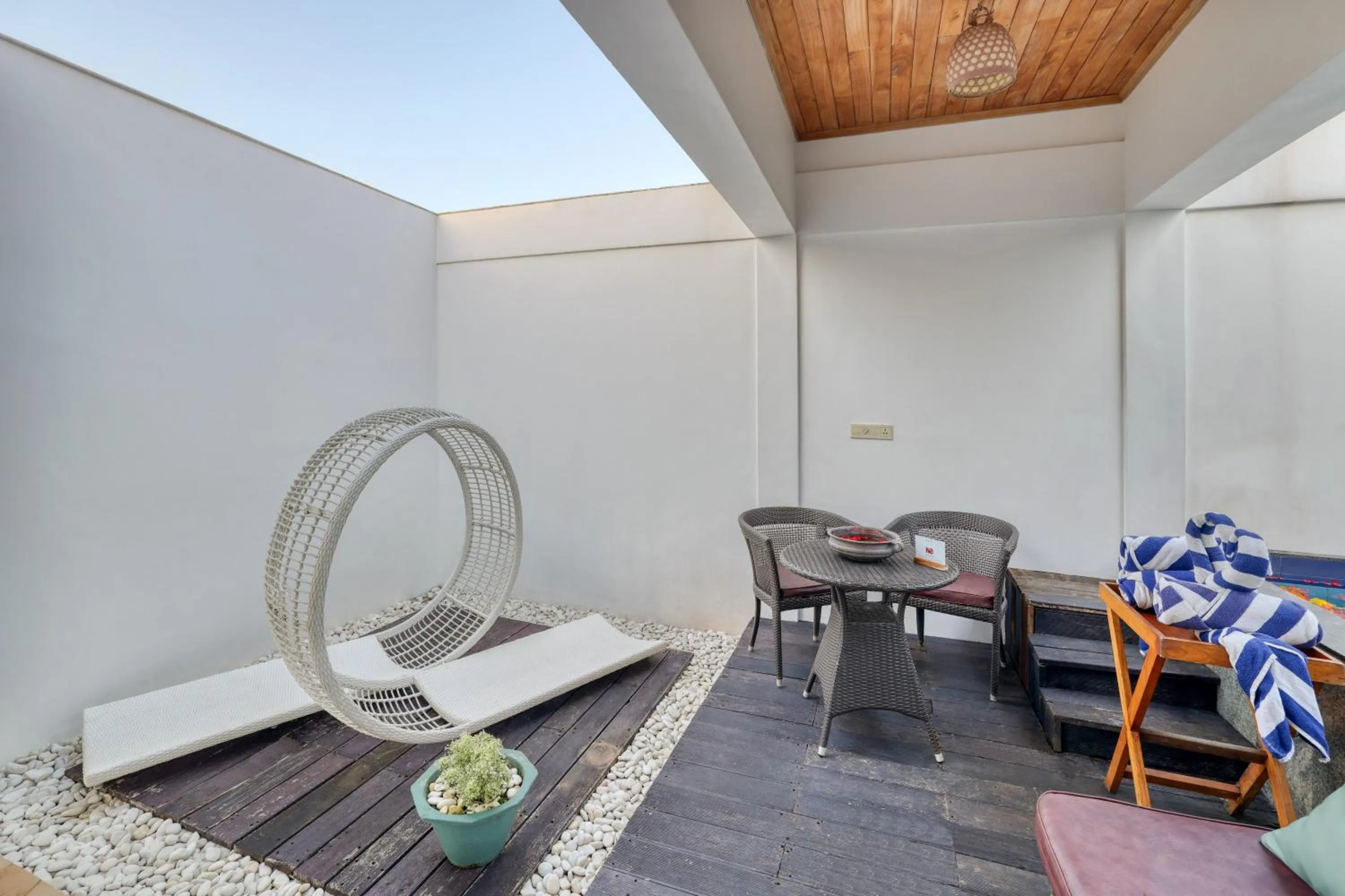 Seating area in Alaya Stays Paloma Backwater Resort