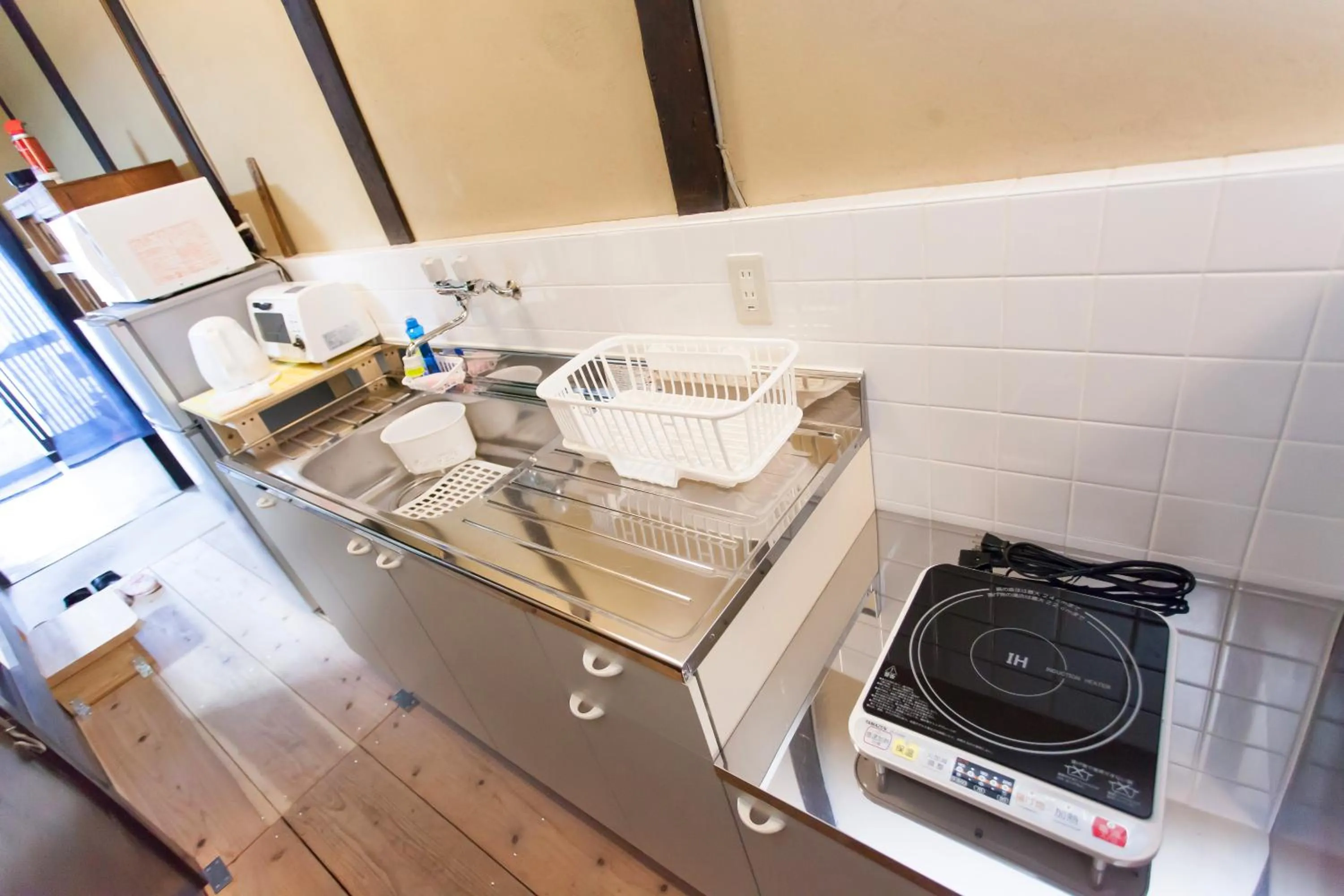 Kitchen or kitchenette in Kujo Stays