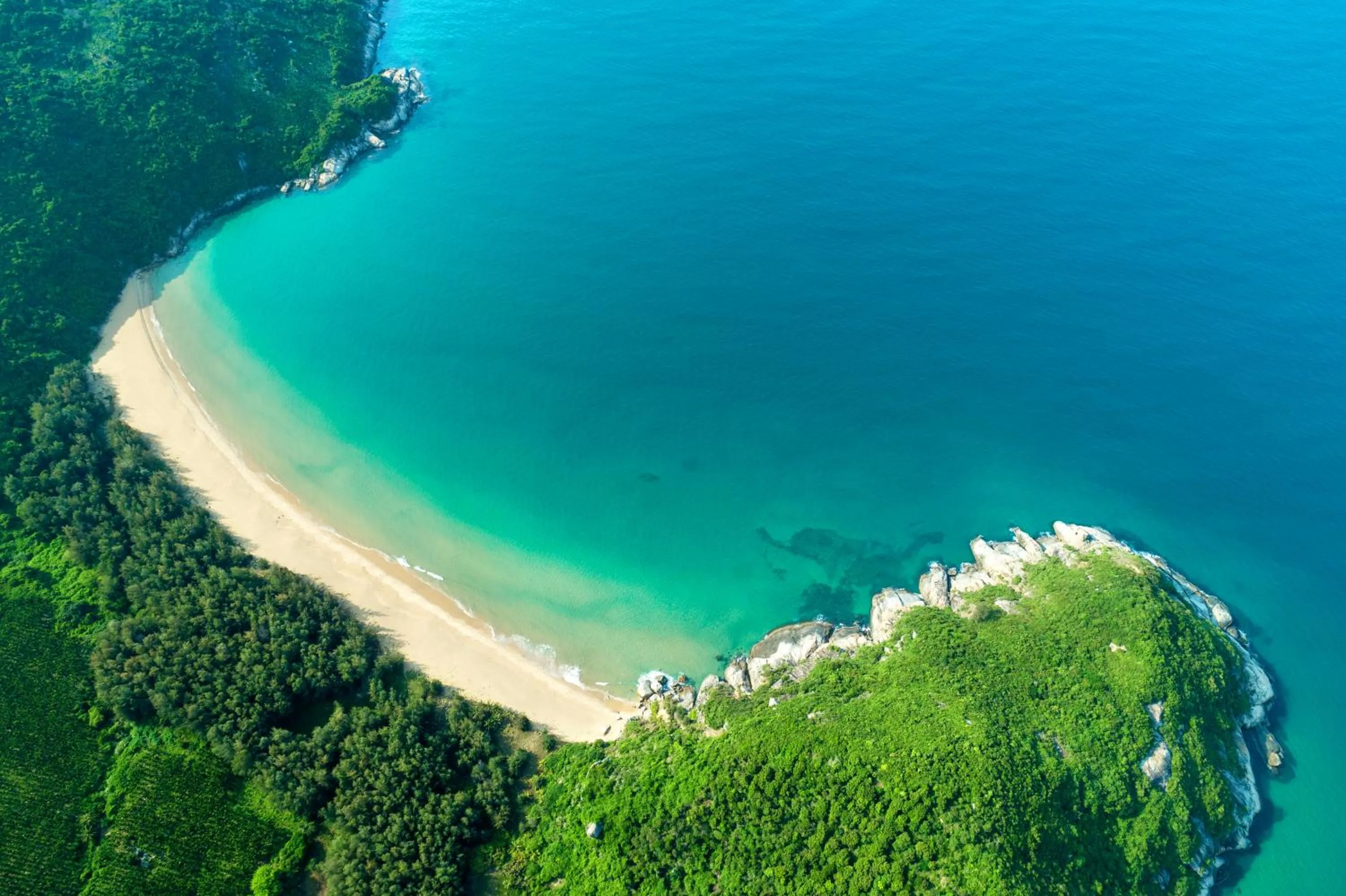 Beach in Holiday Inn Resort Wanning Shenzhou Peninsula by IHG