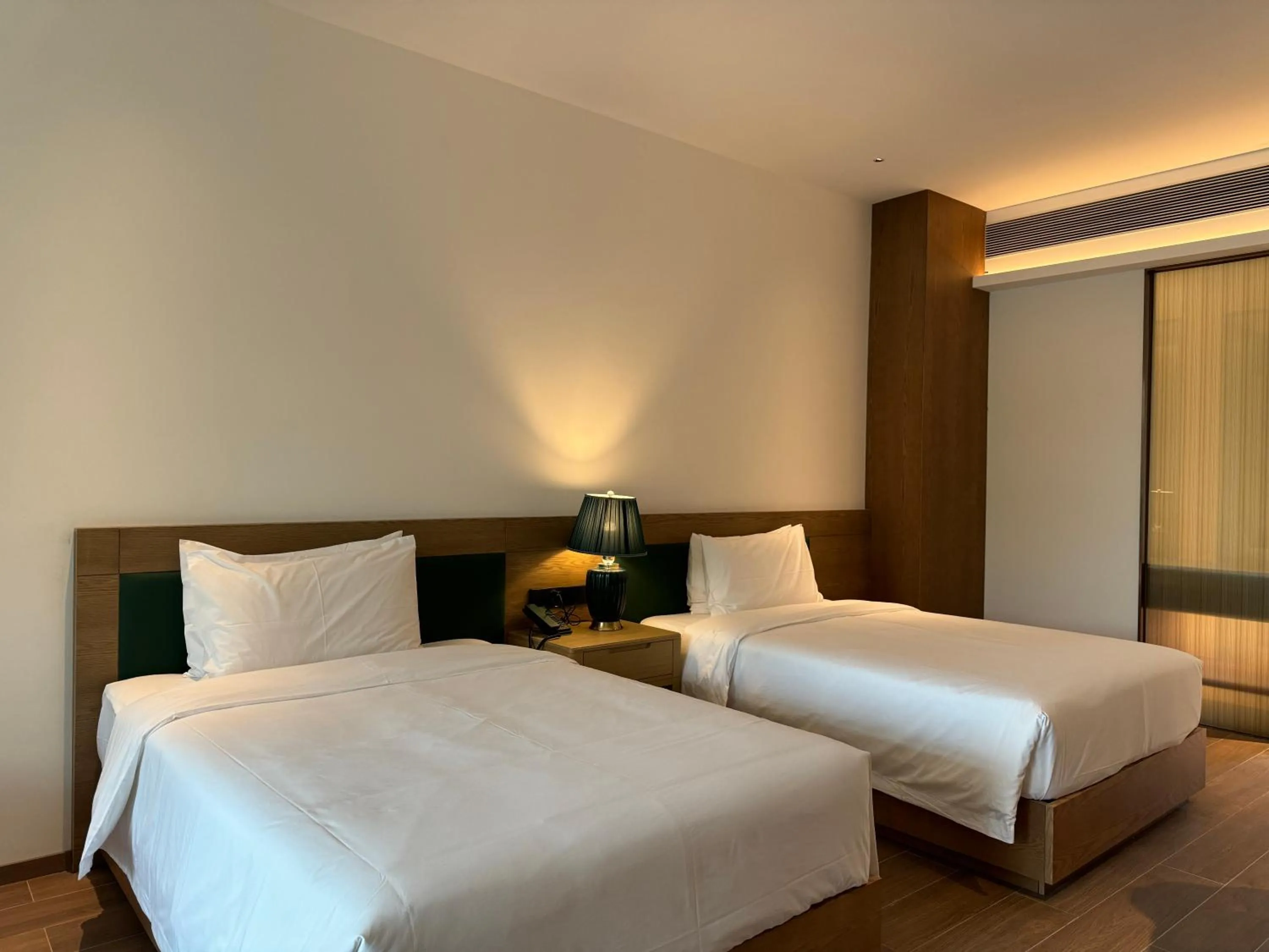 Bed in Holiday Inn Resort Wanning Shenzhou Peninsula by IHG