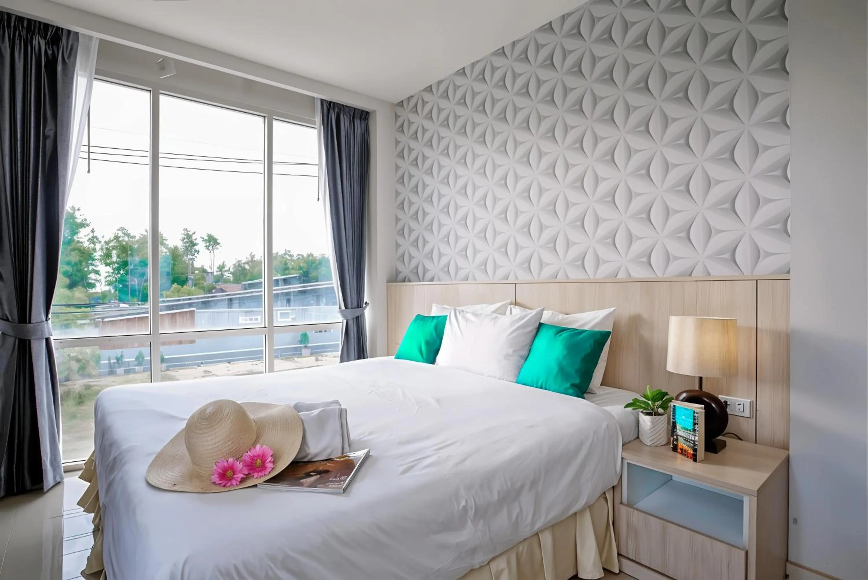 Bed in The Wings Boutique Hotels Krabi Ko Lanta