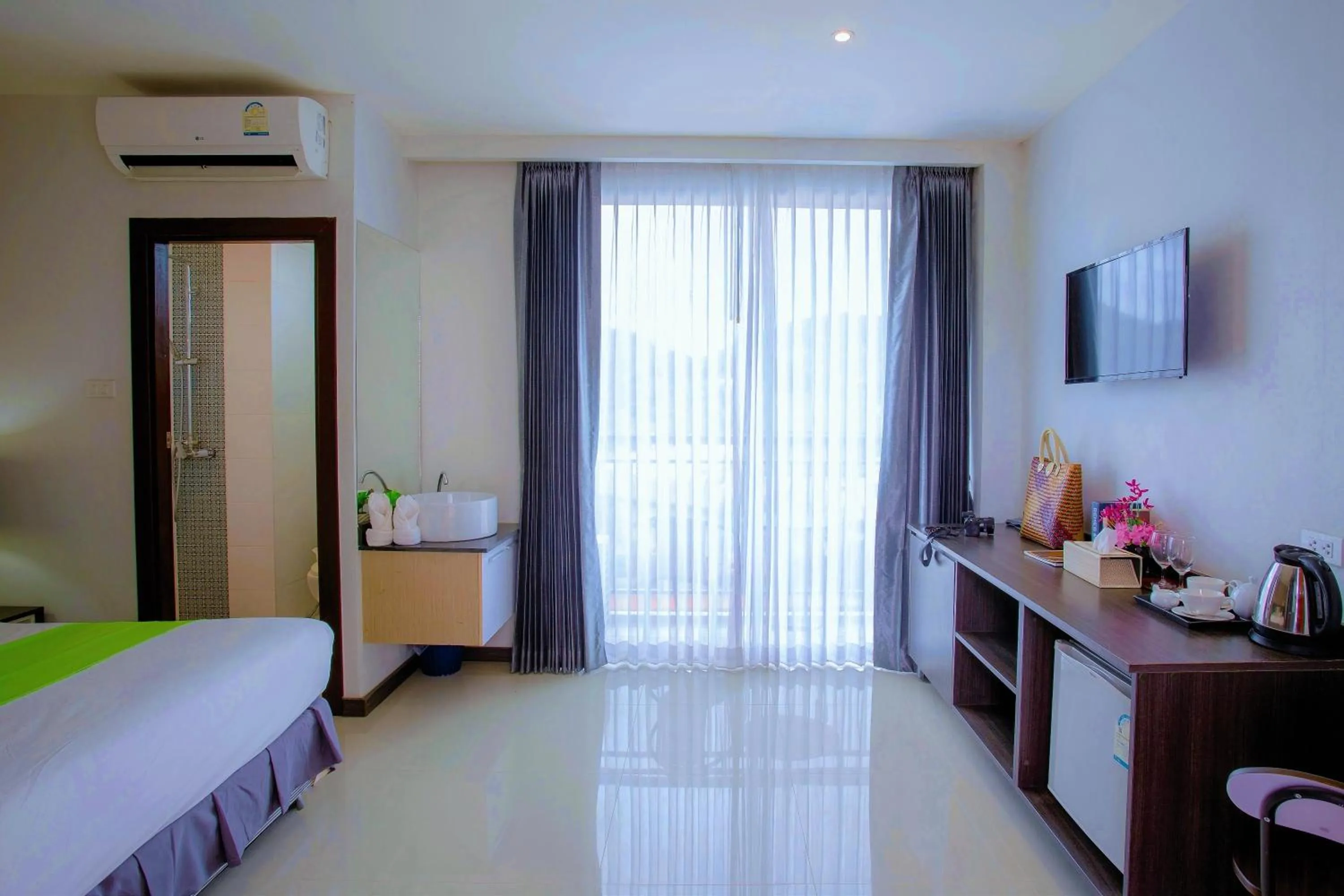 Communal lounge/ TV room, Bed in The Wings Boutique Hotels Krabi Ko Lanta