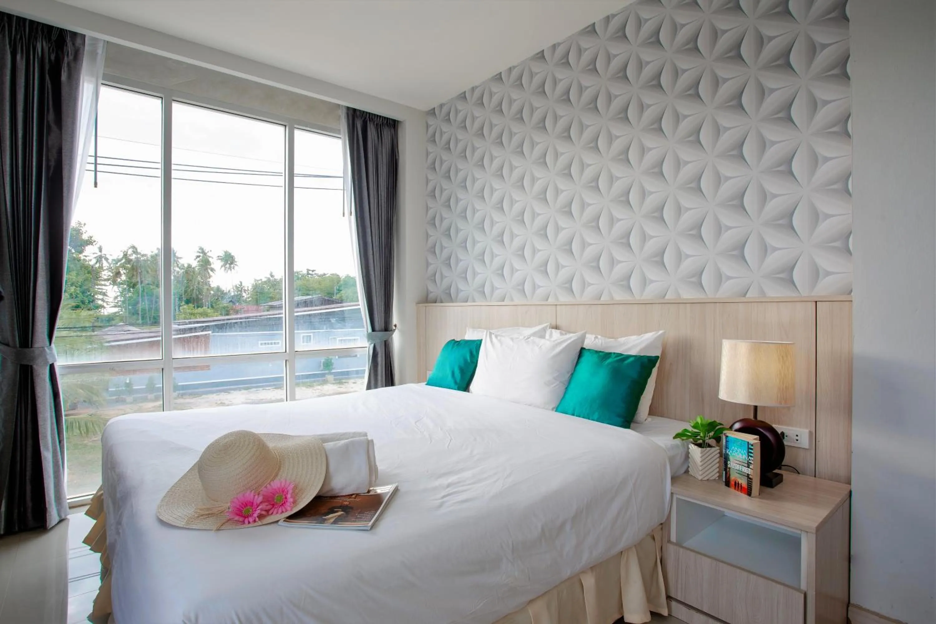 Bed in The Wings Boutique Hotels Krabi Ko Lanta