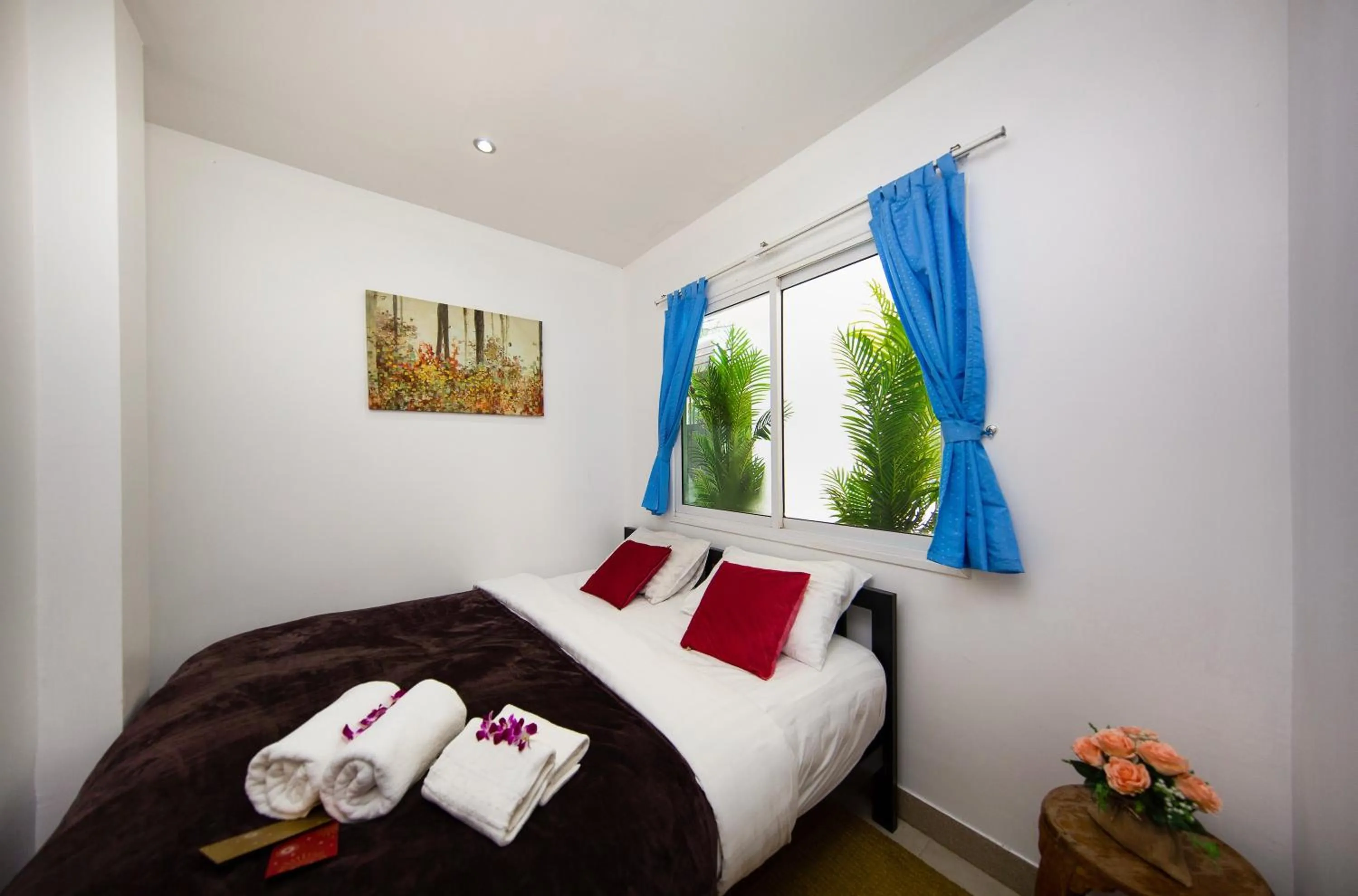 Bed in Paradise Pool Villa Pattaya in Tropicana Village