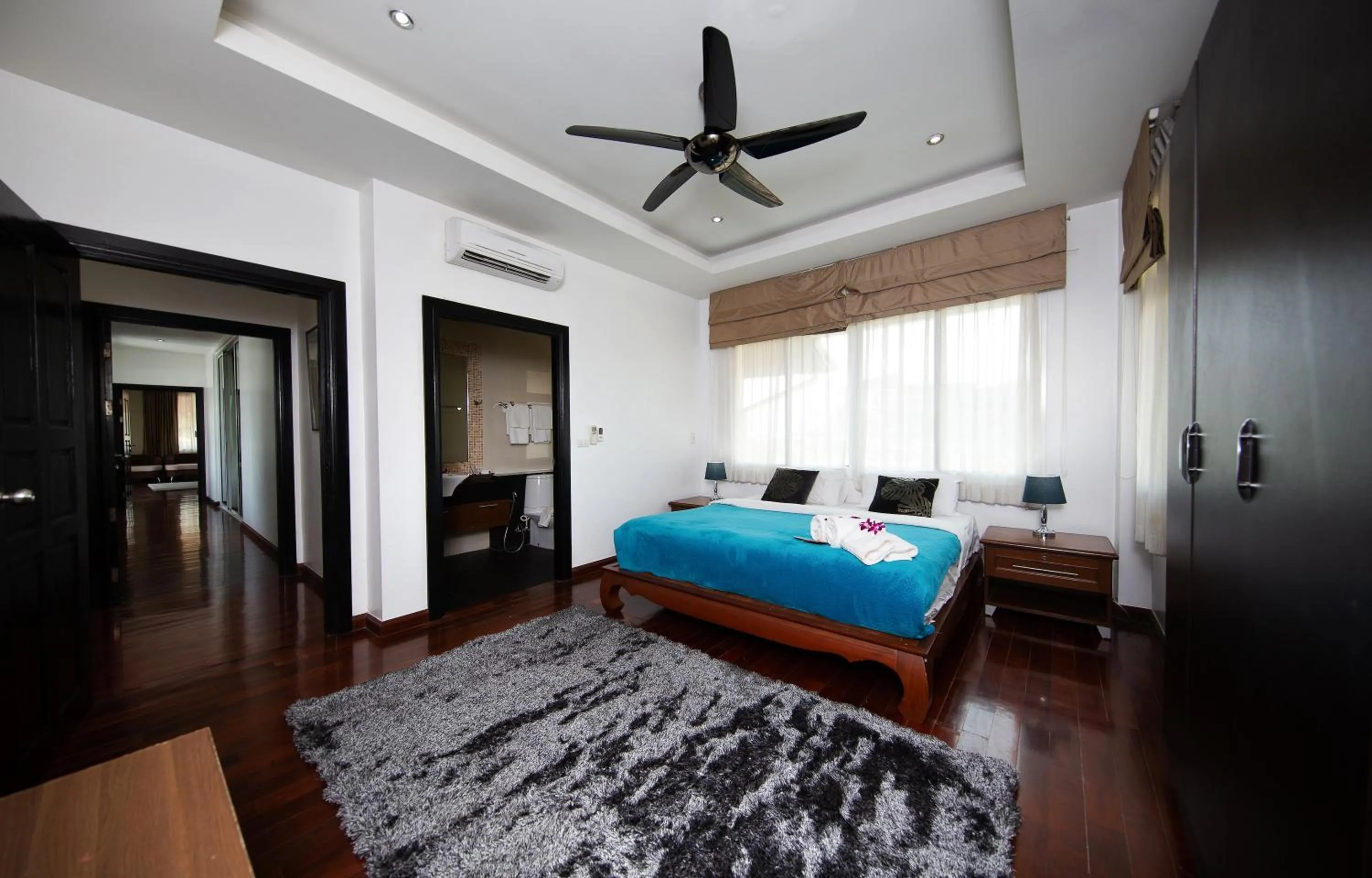 Bed in Paradise Pool Villa Pattaya in Tropicana Village