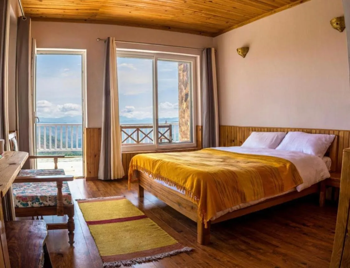 Bed in Kasar Rainbow Yoga Retreat