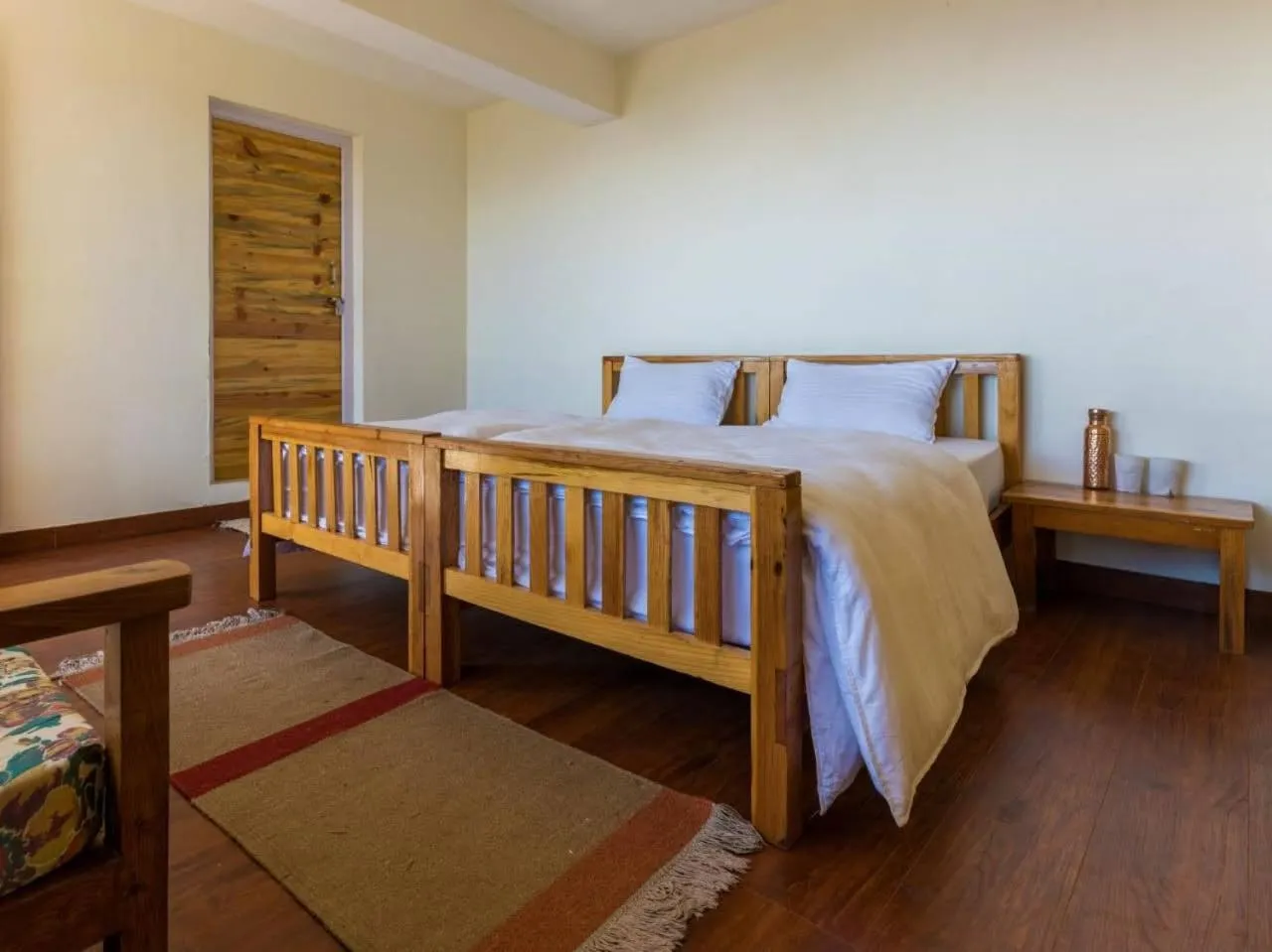 Photo of the whole room, Bed in Kasar Rainbow Yoga Retreat