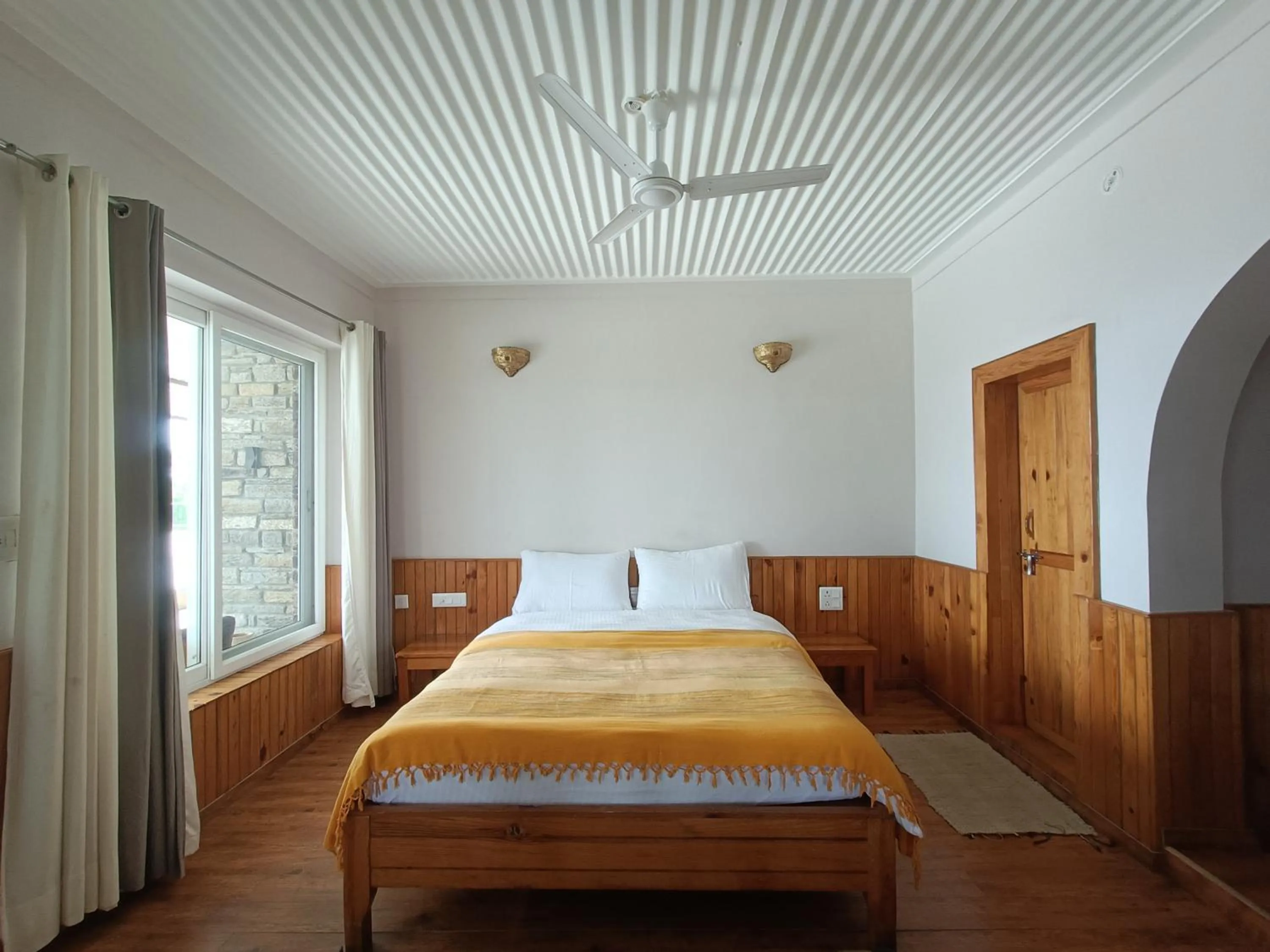 Bed in Kasar Rainbow Yoga Retreat