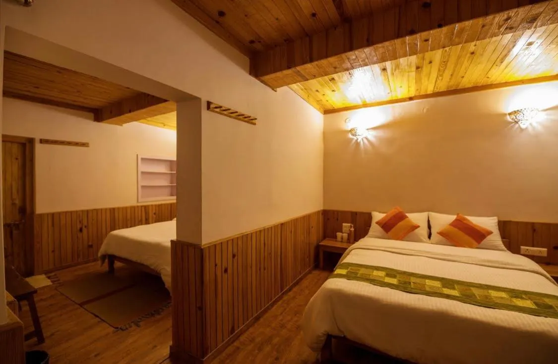Bed in Kasar Rainbow Yoga Retreat