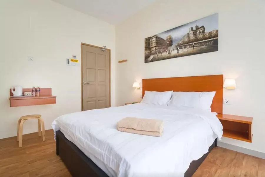 Bed in Penang Hill Lodge