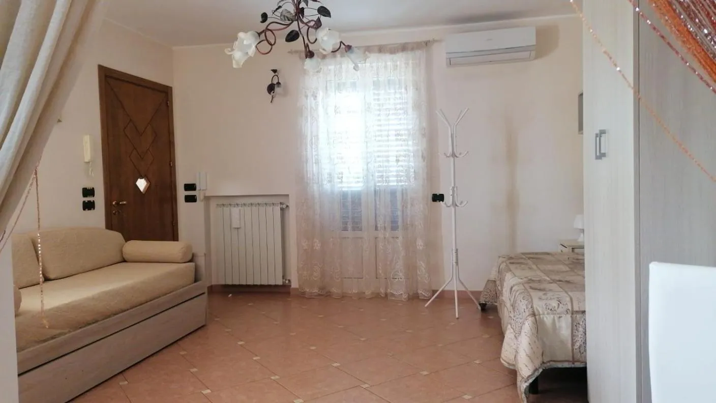 Living room, Bed in DIMORA ANTONIANNA in VALLE D'ITRIA