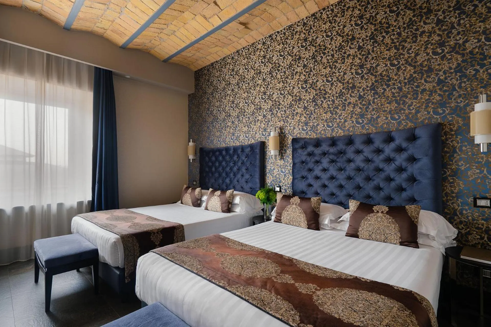 Bed in Unica Suites Rome