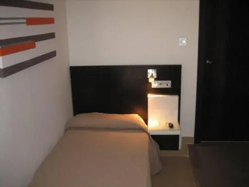 Photo of the whole room, Bed in Hostal Central