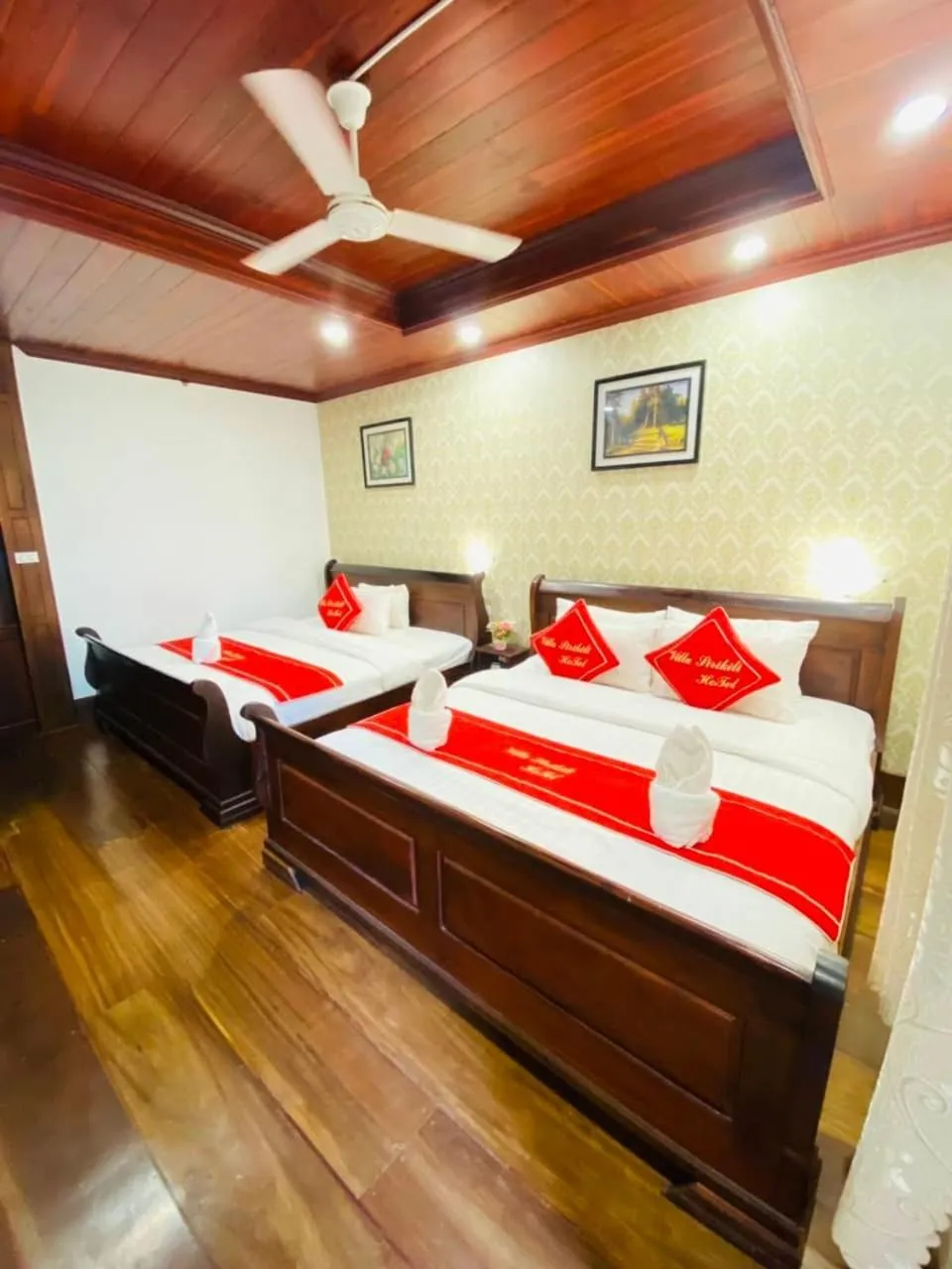 Bed in Villa Sirikili Hotel Luang Prabang