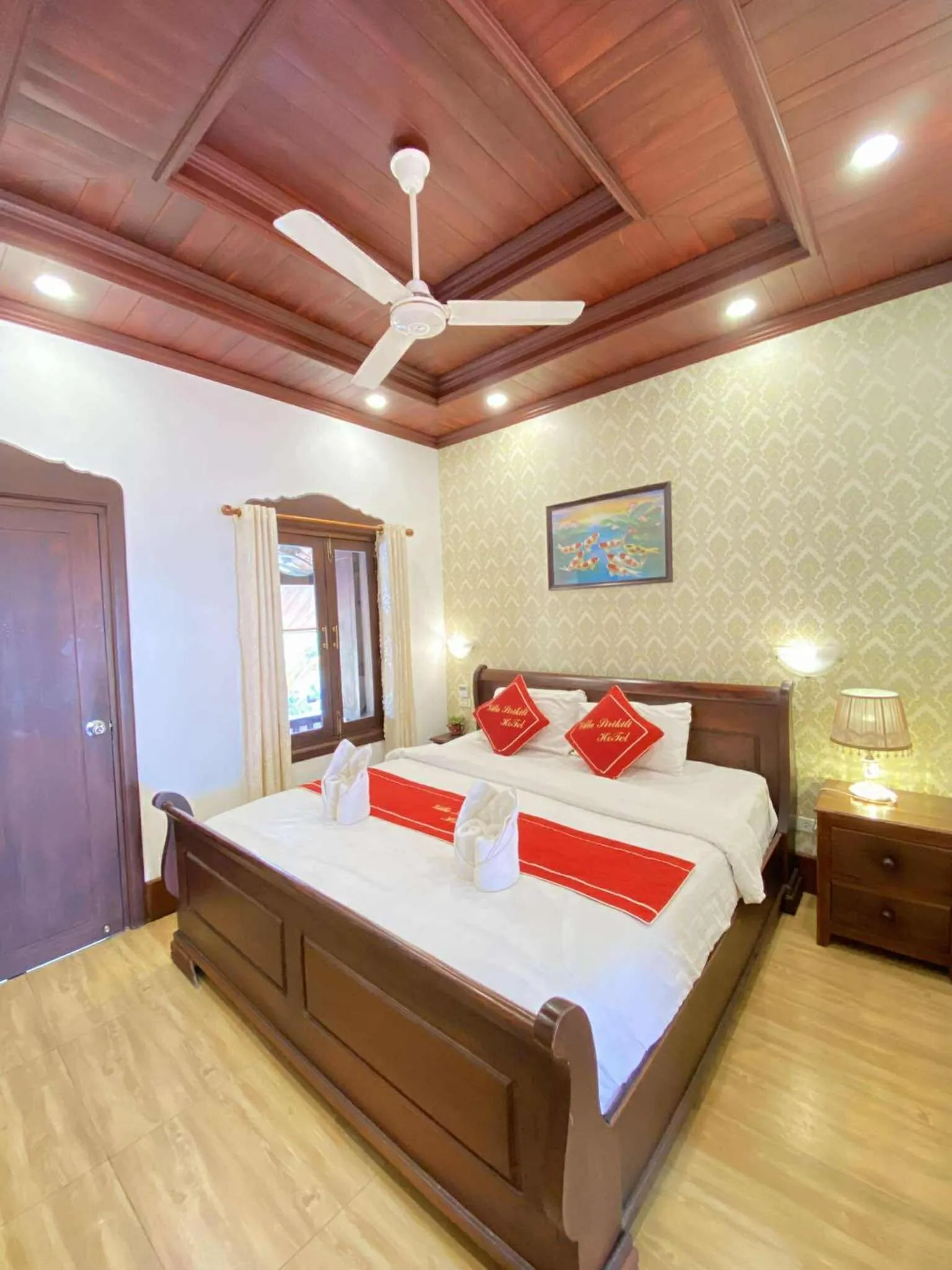 Bed in Villa Sirikili Hotel Luang Prabang