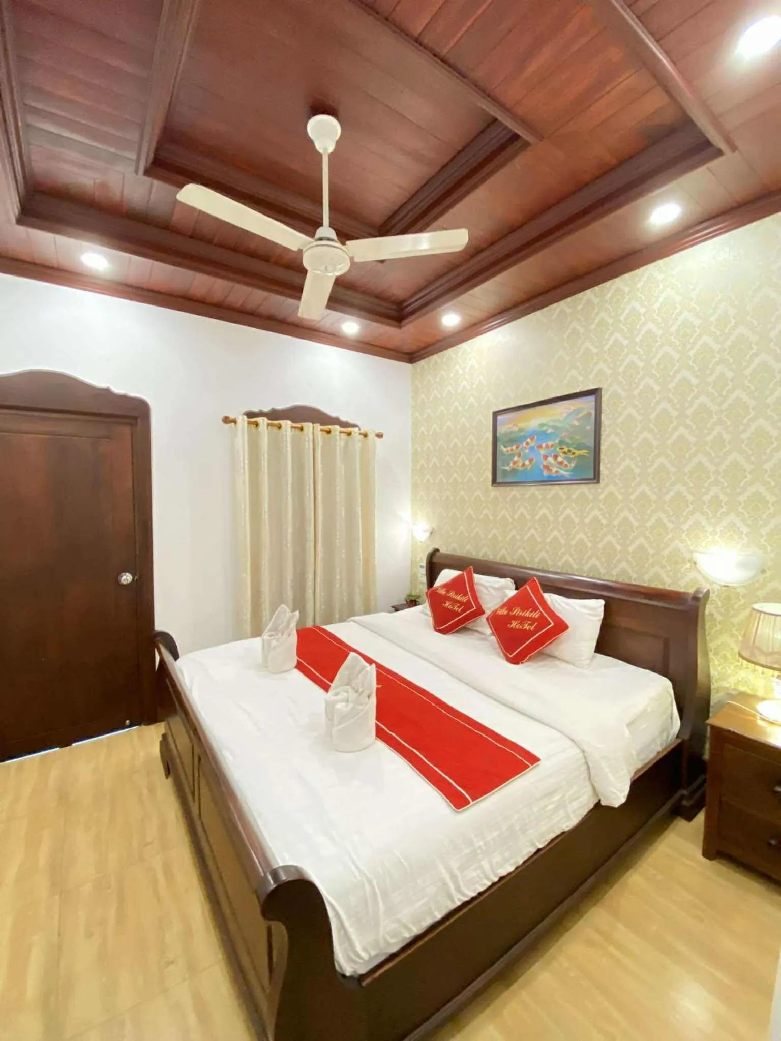 Bed in Villa Sirikili Hotel Luang Prabang