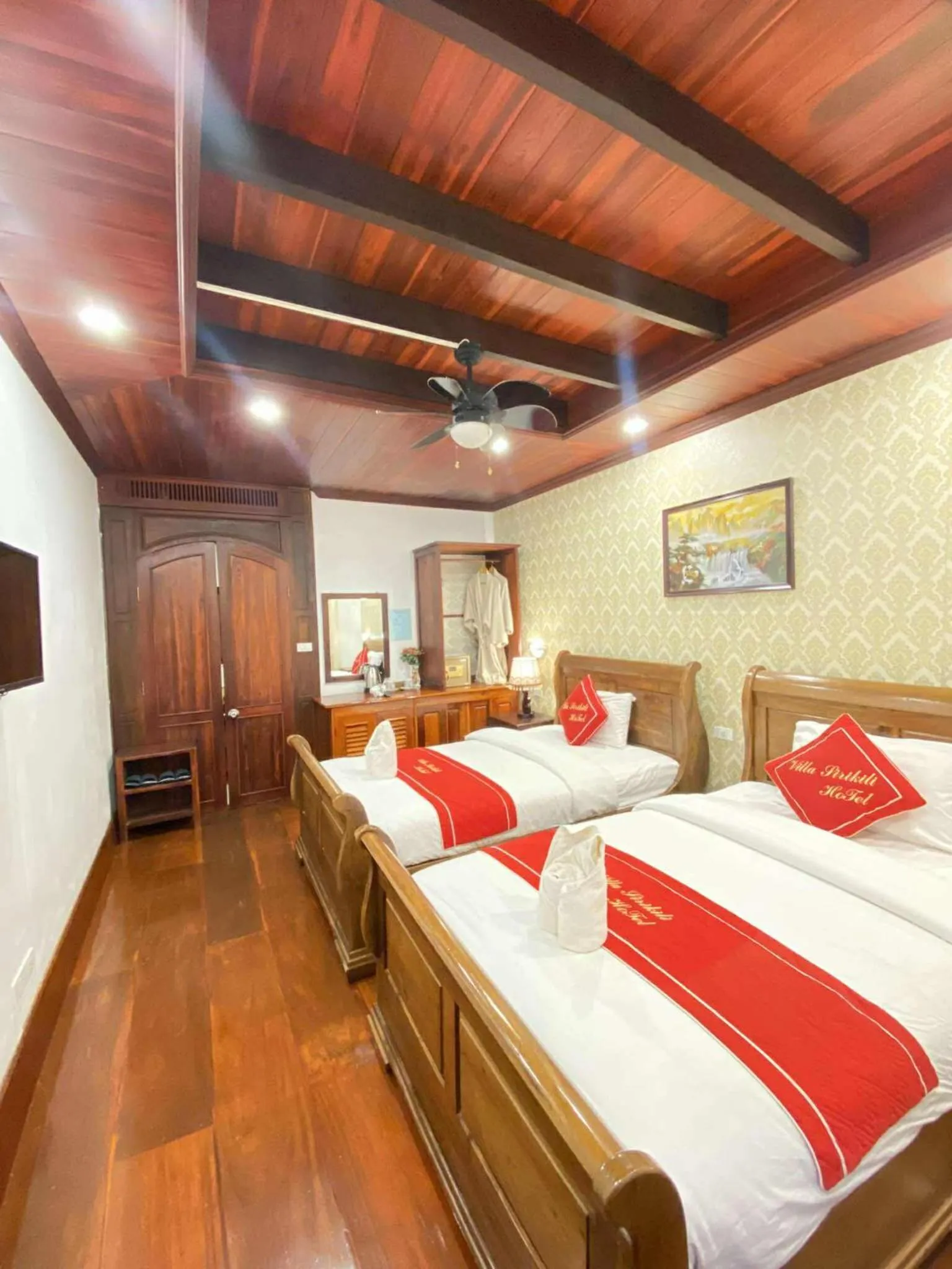 Bed in Villa Sirikili Hotel Luang Prabang