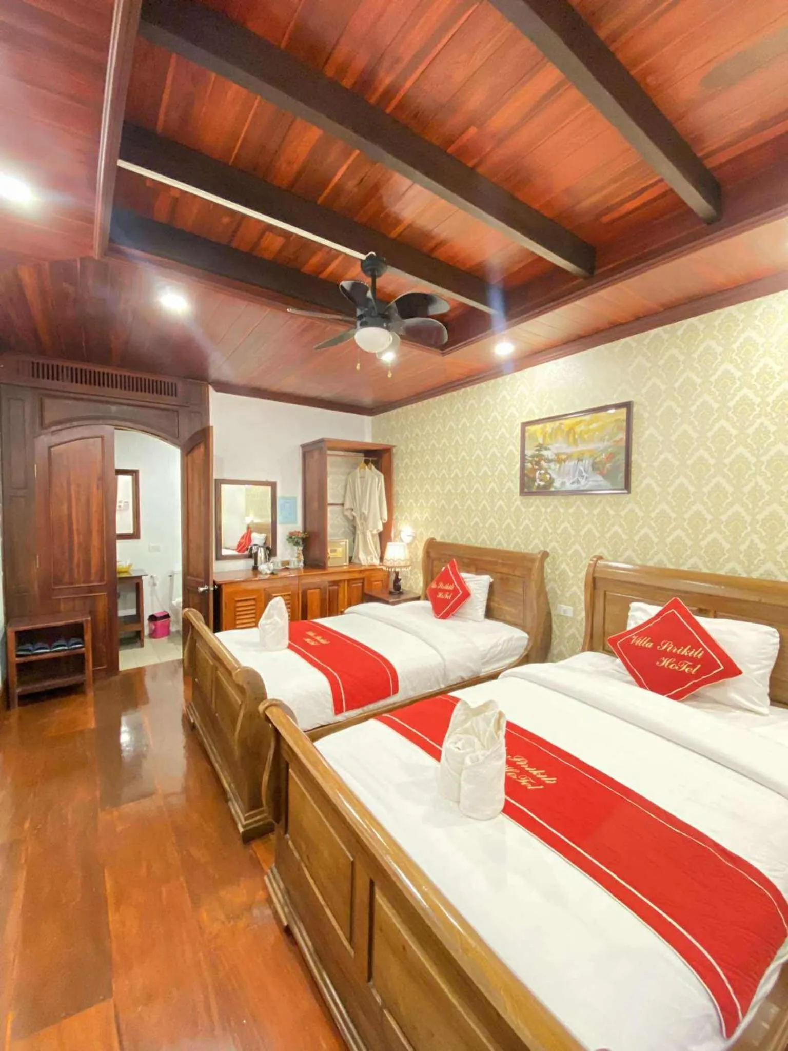 Bed in Villa Sirikili Hotel Luang Prabang