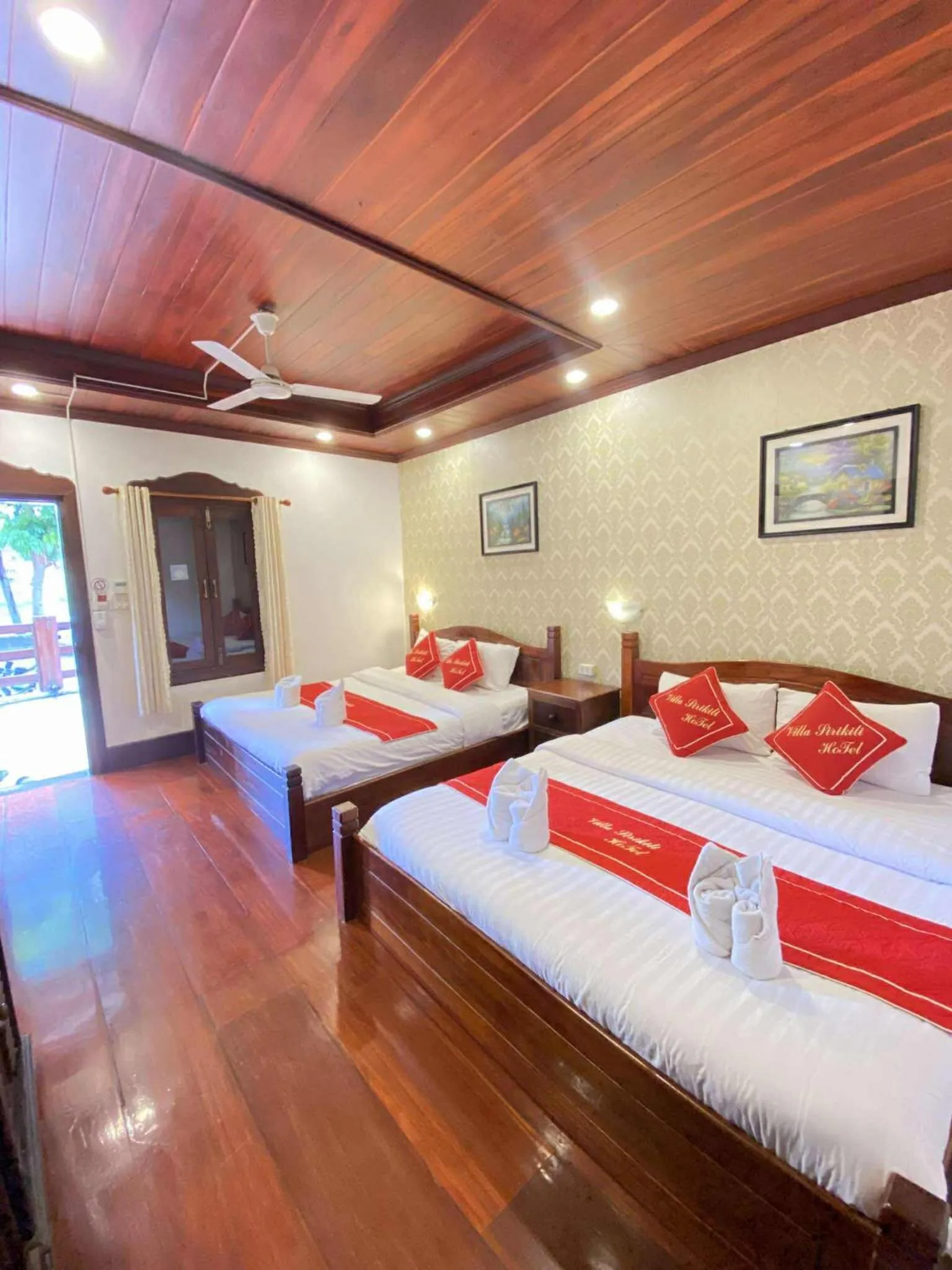 Photo of the whole room, Bed in Villa Sirikili Hotel Luang Prabang