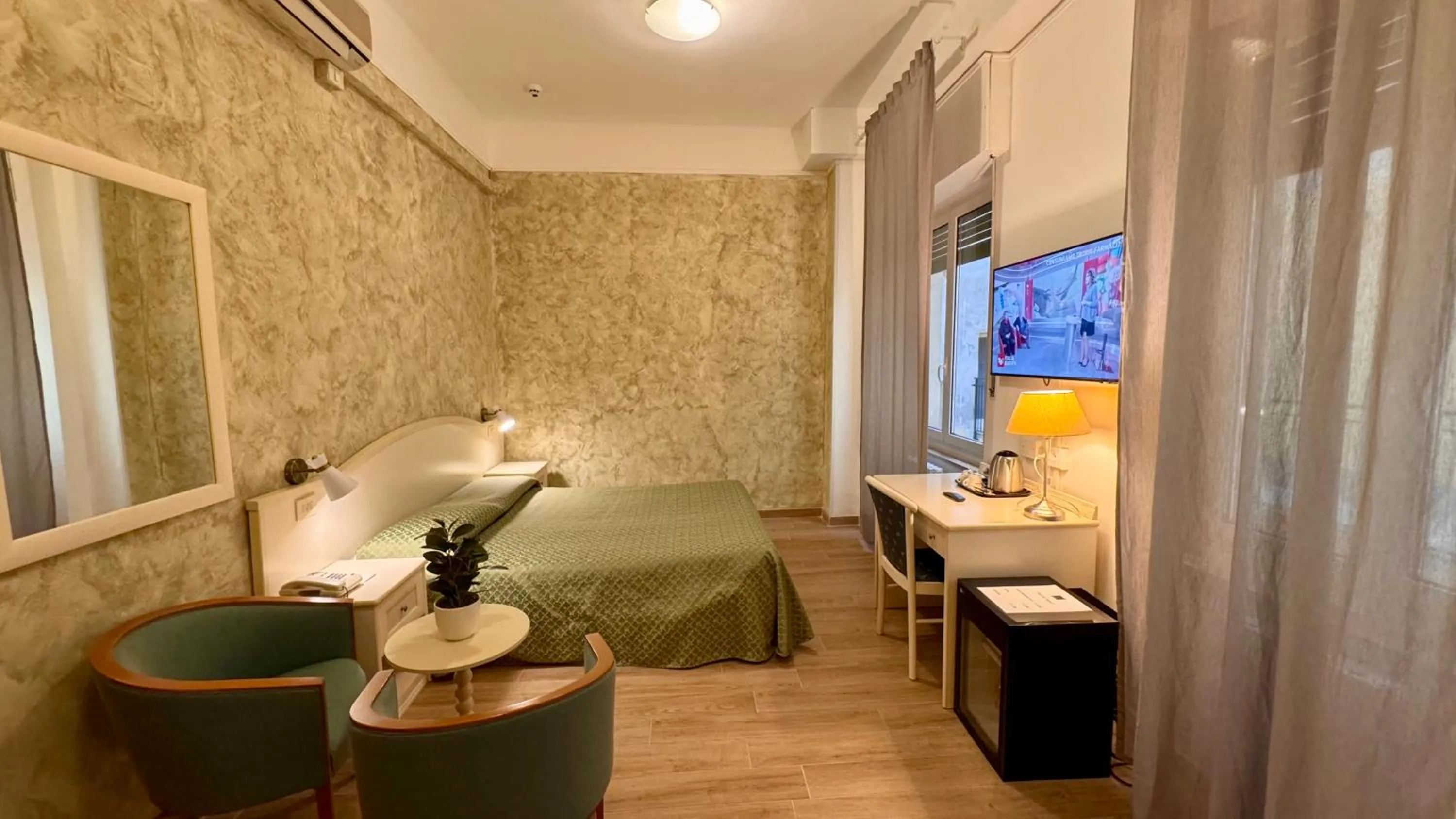 Bed in Hotel Arcadia