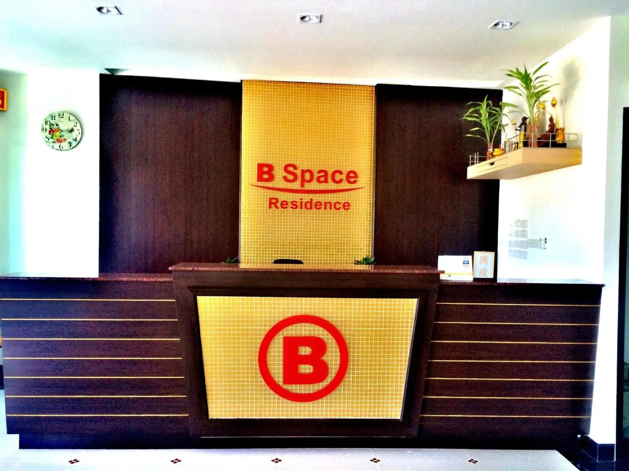 Property logo or sign in B Space Residence