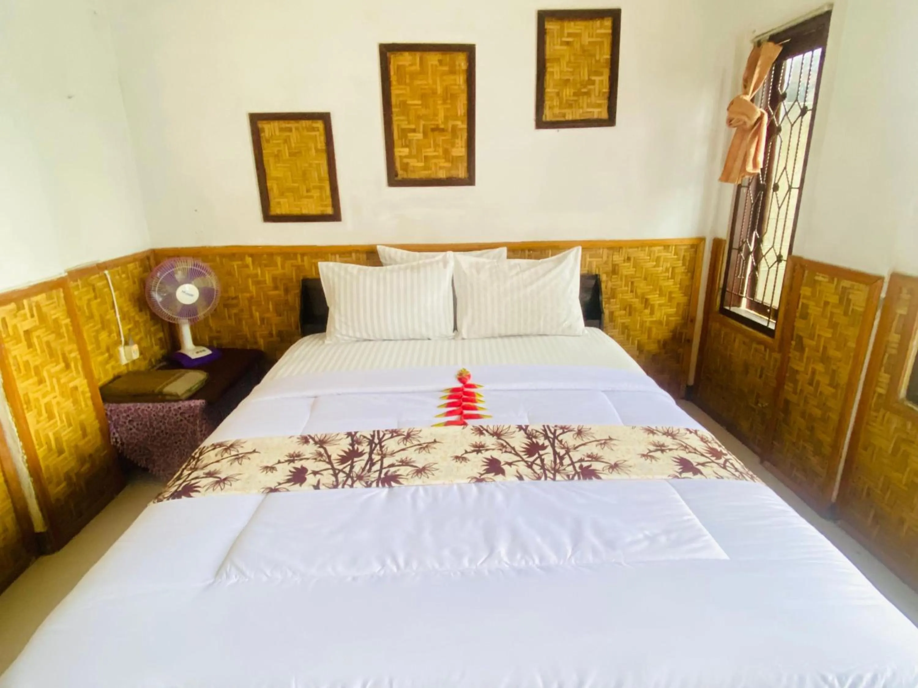 Bed in Kembang Kuning Cottages