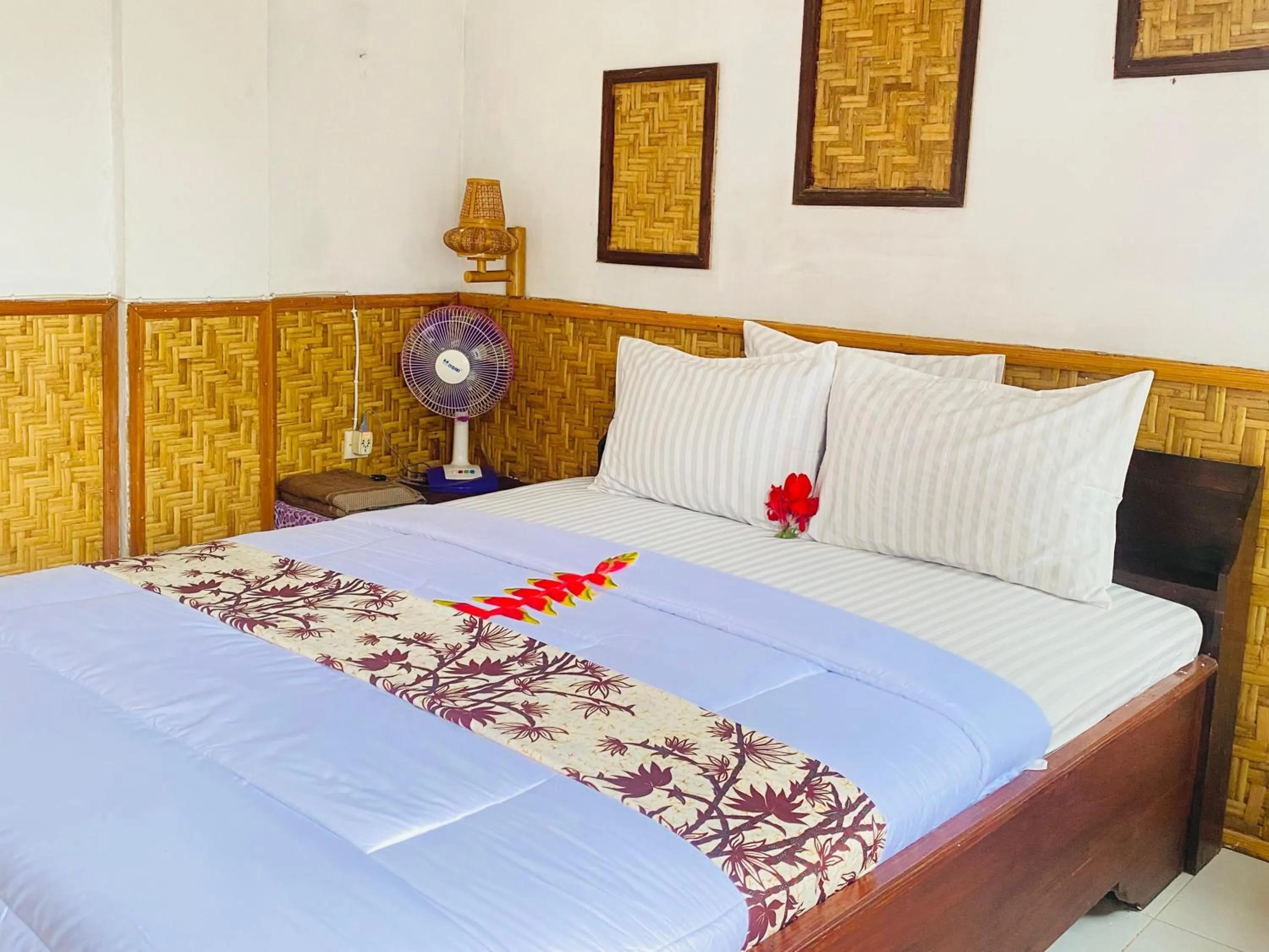 Bed in Kembang Kuning Cottages