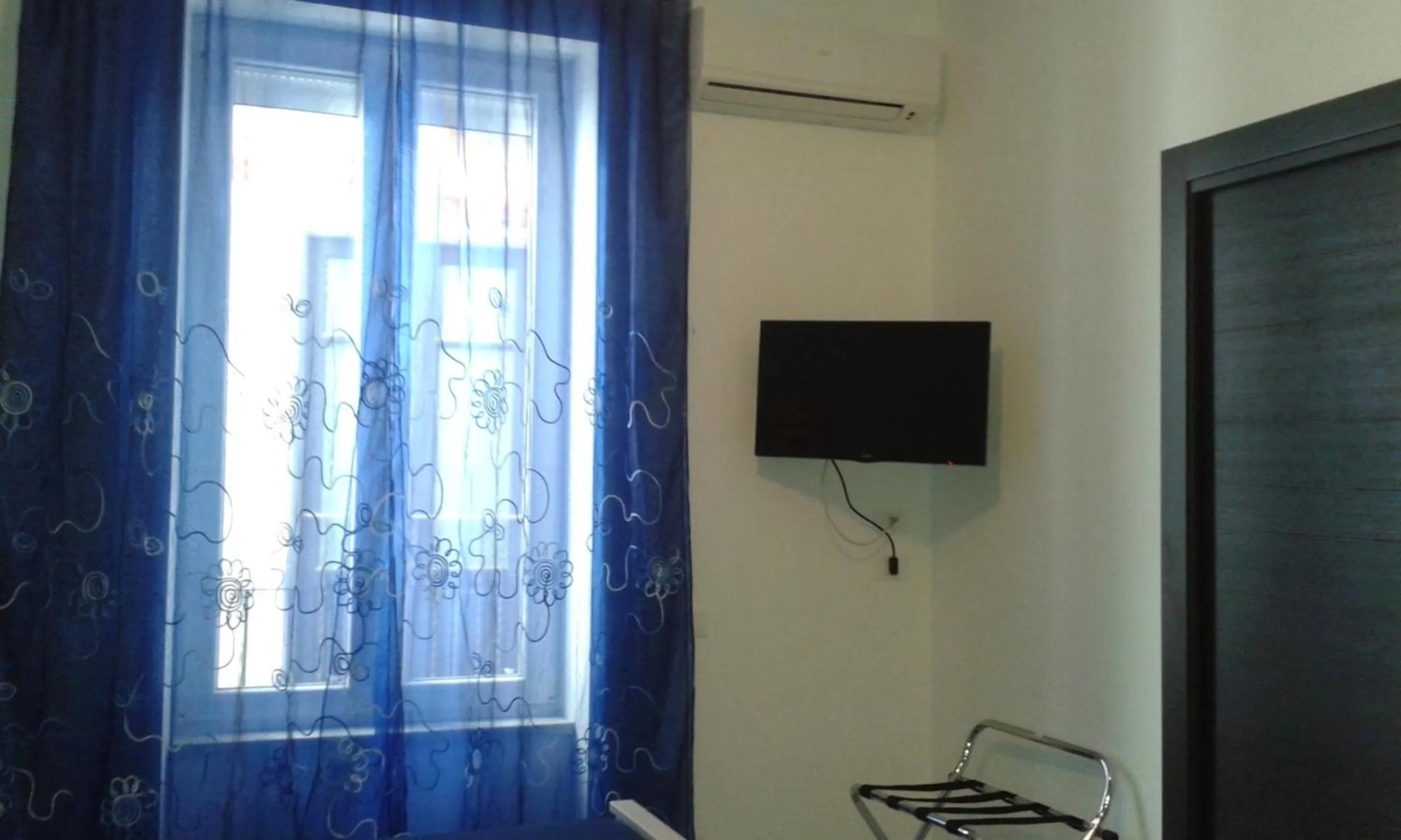 Bedroom in Buonaluna B&B