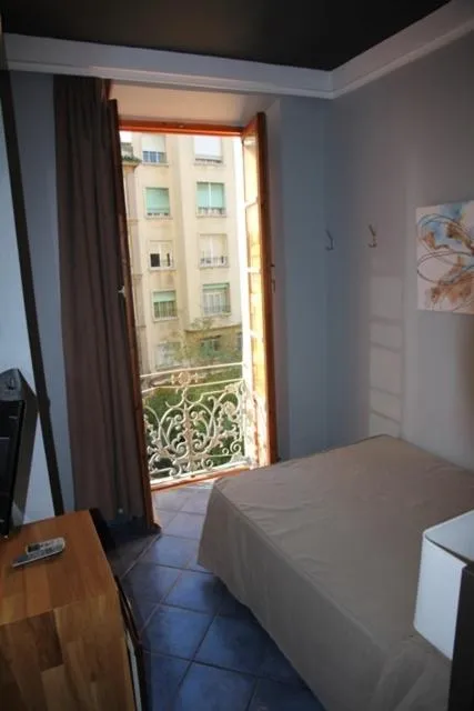 Photo of the whole room, Bed in Hostal Plaza Ruiz