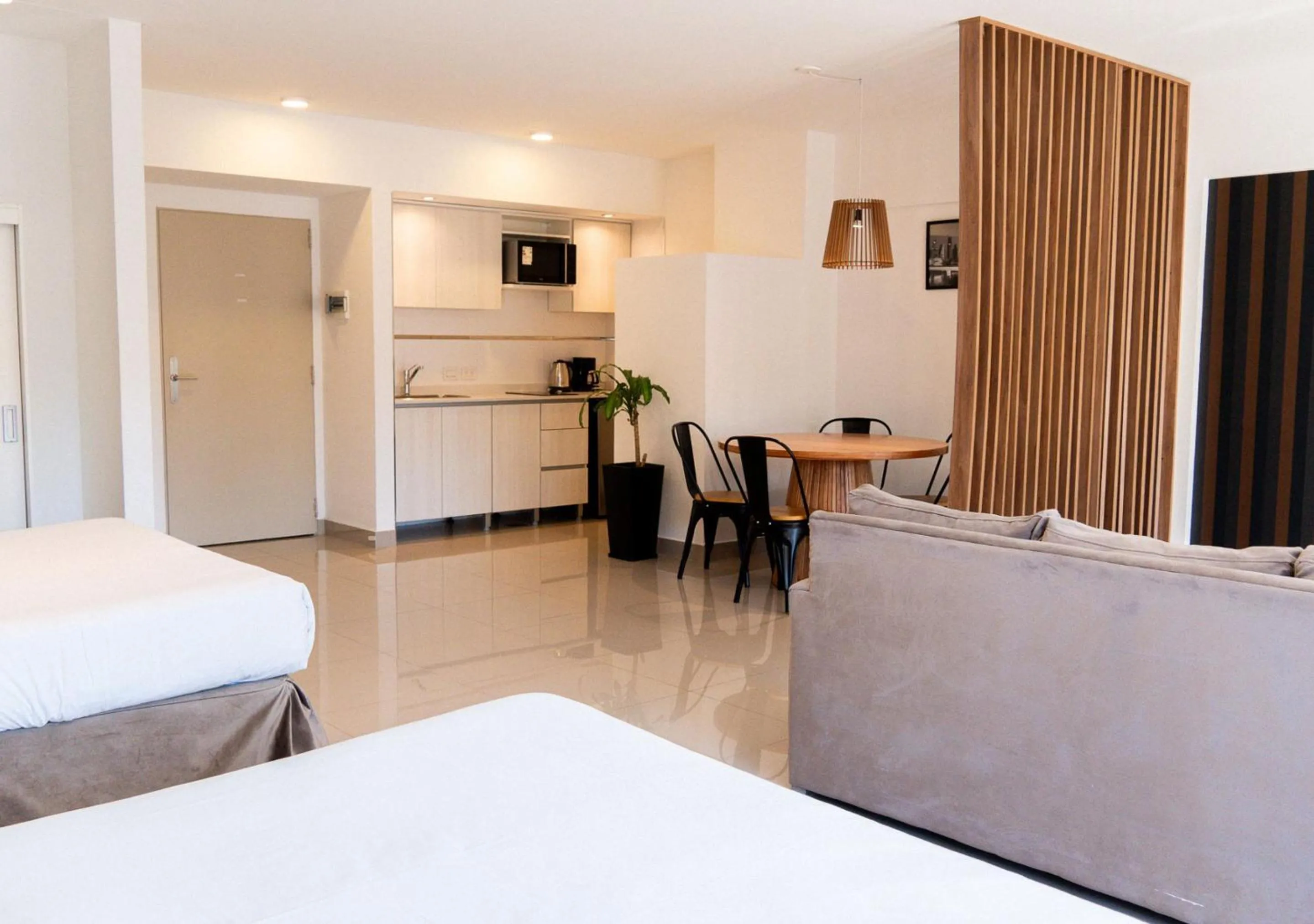 kitchen, Bed in La Cisterna by DOT Suites