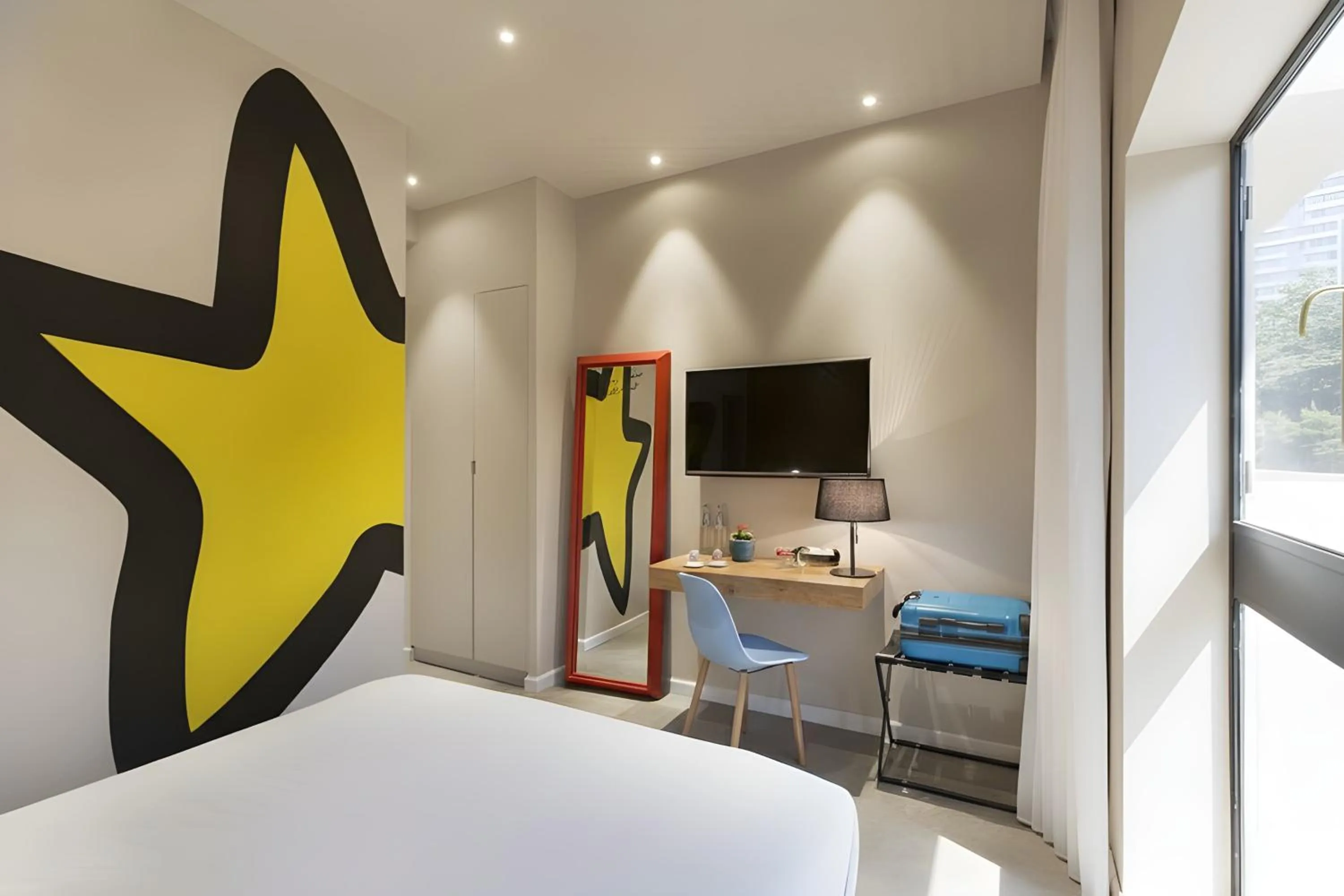 TV and multimedia, Bed in Cucu Hotel