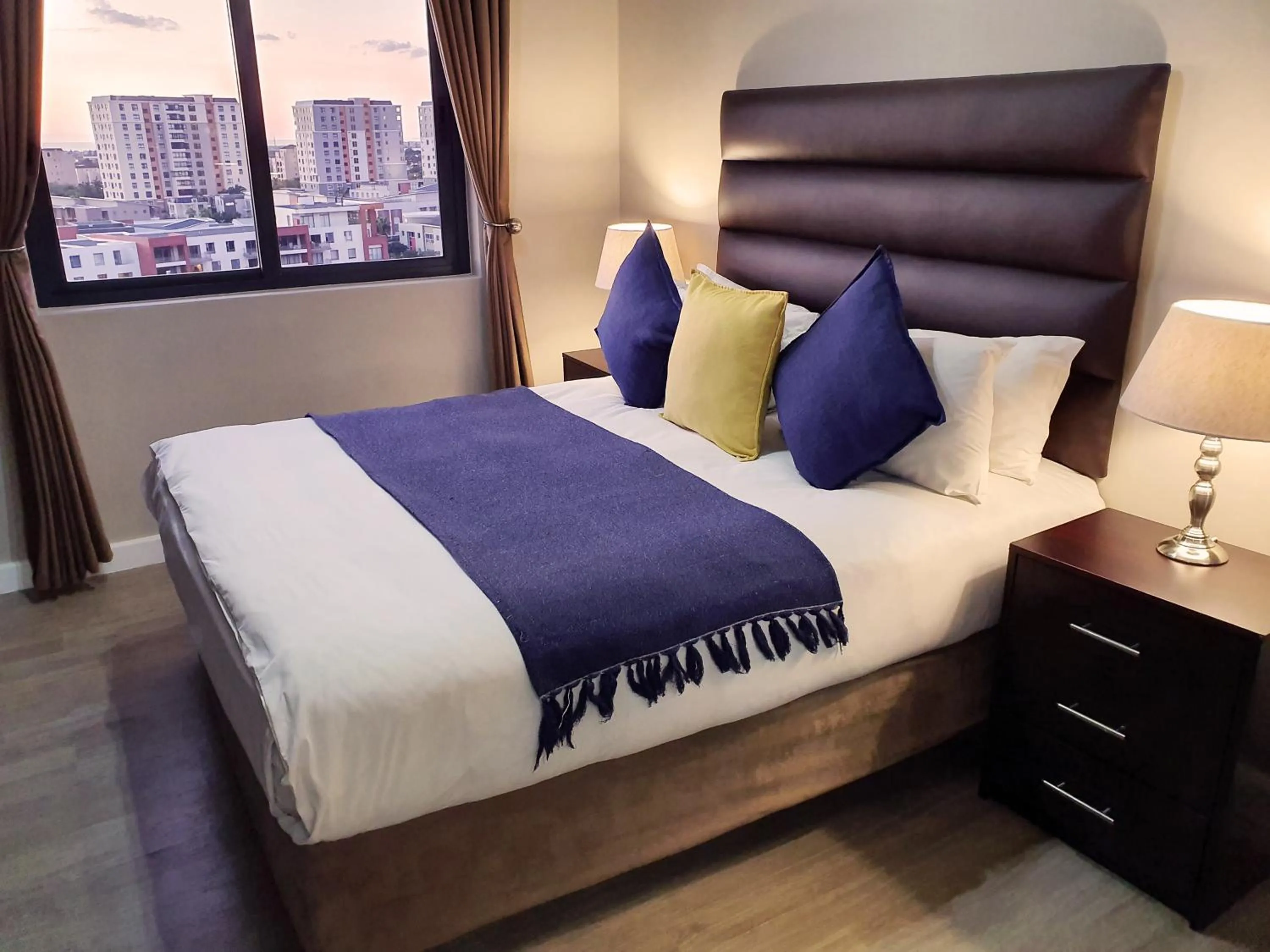 Bed in Knightsbridge Luxury Apartments