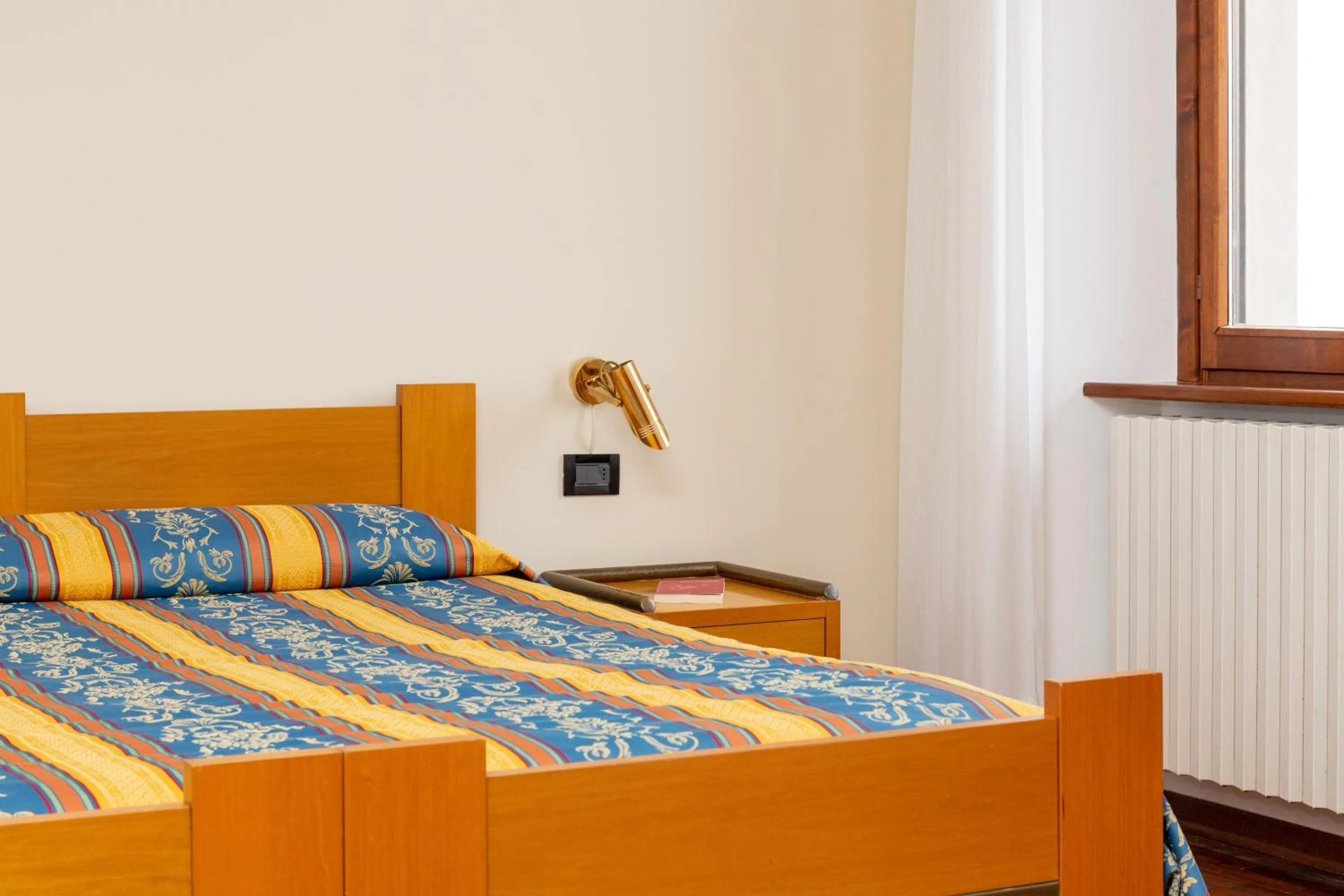 Photo of the whole room, Bed in Albergo Sacro Monte Varese