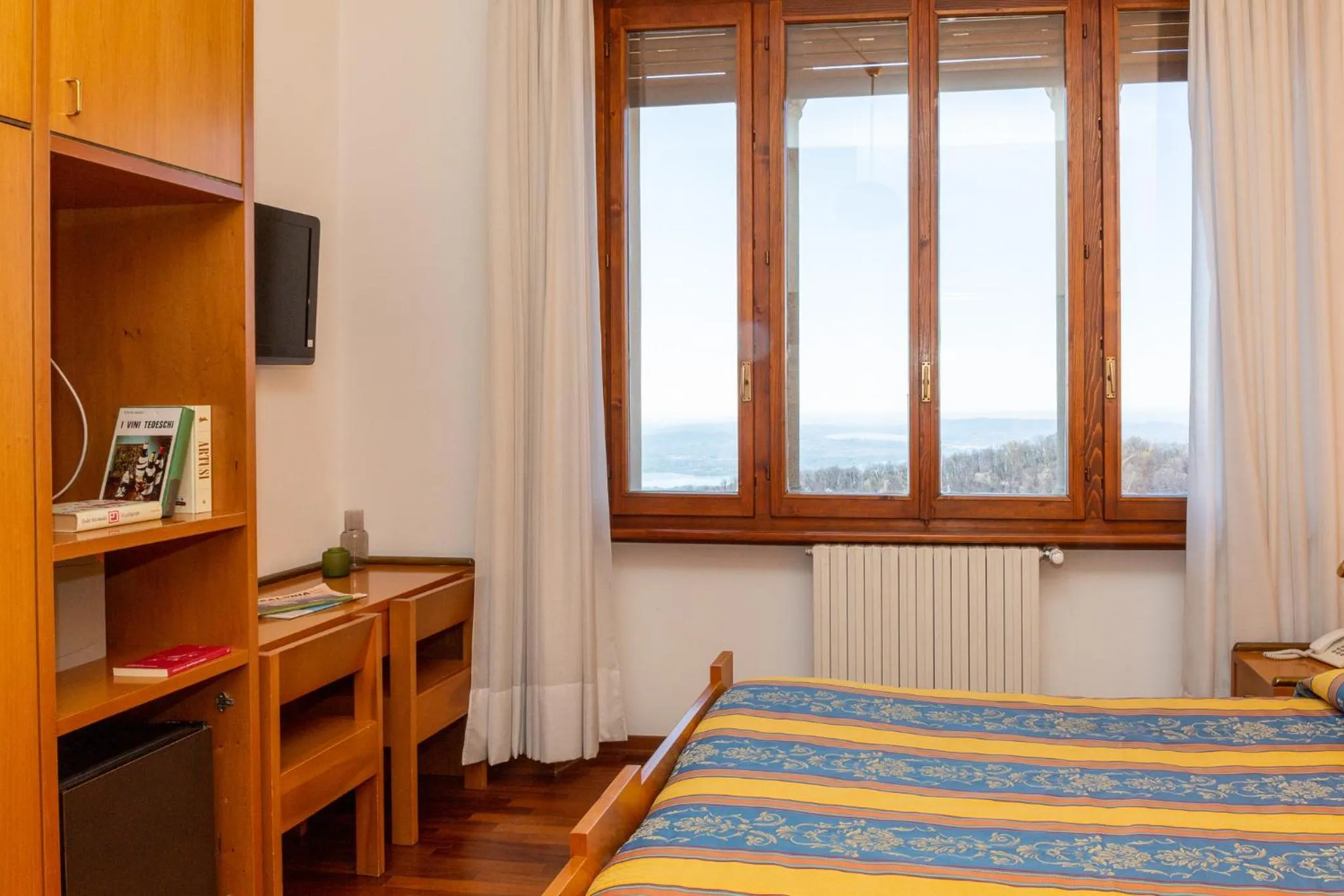 Photo of the whole room, Bed in Albergo Sacro Monte Varese