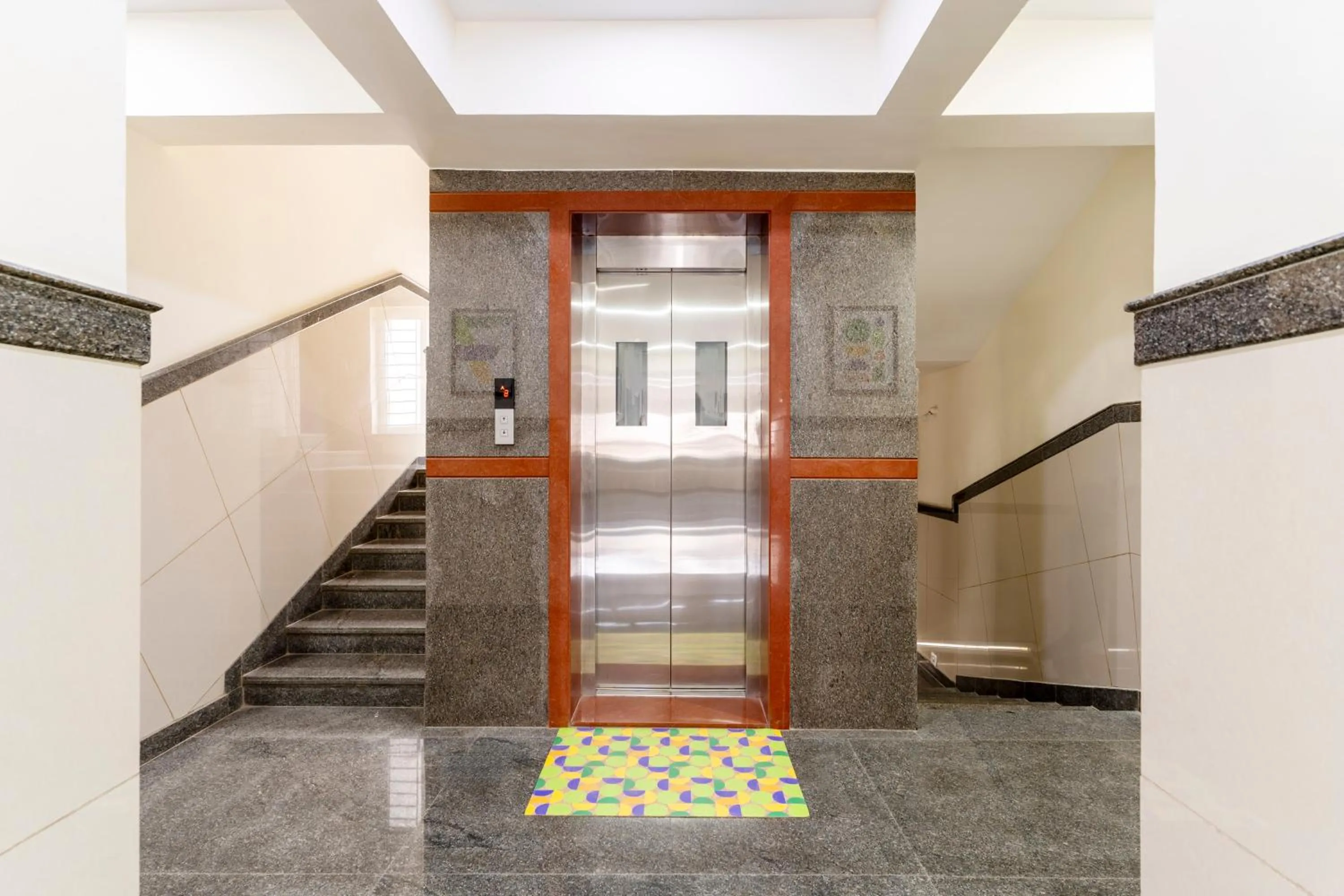 elevator in Treebo Orchid Silver