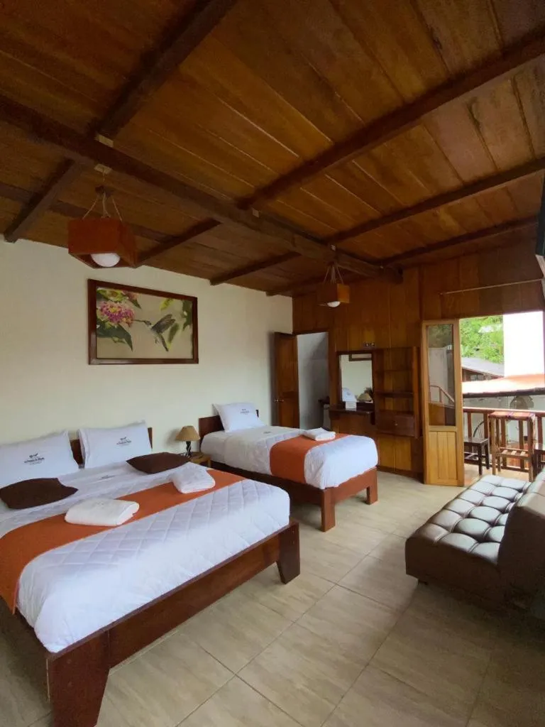 Bed in La Posada de Mindo