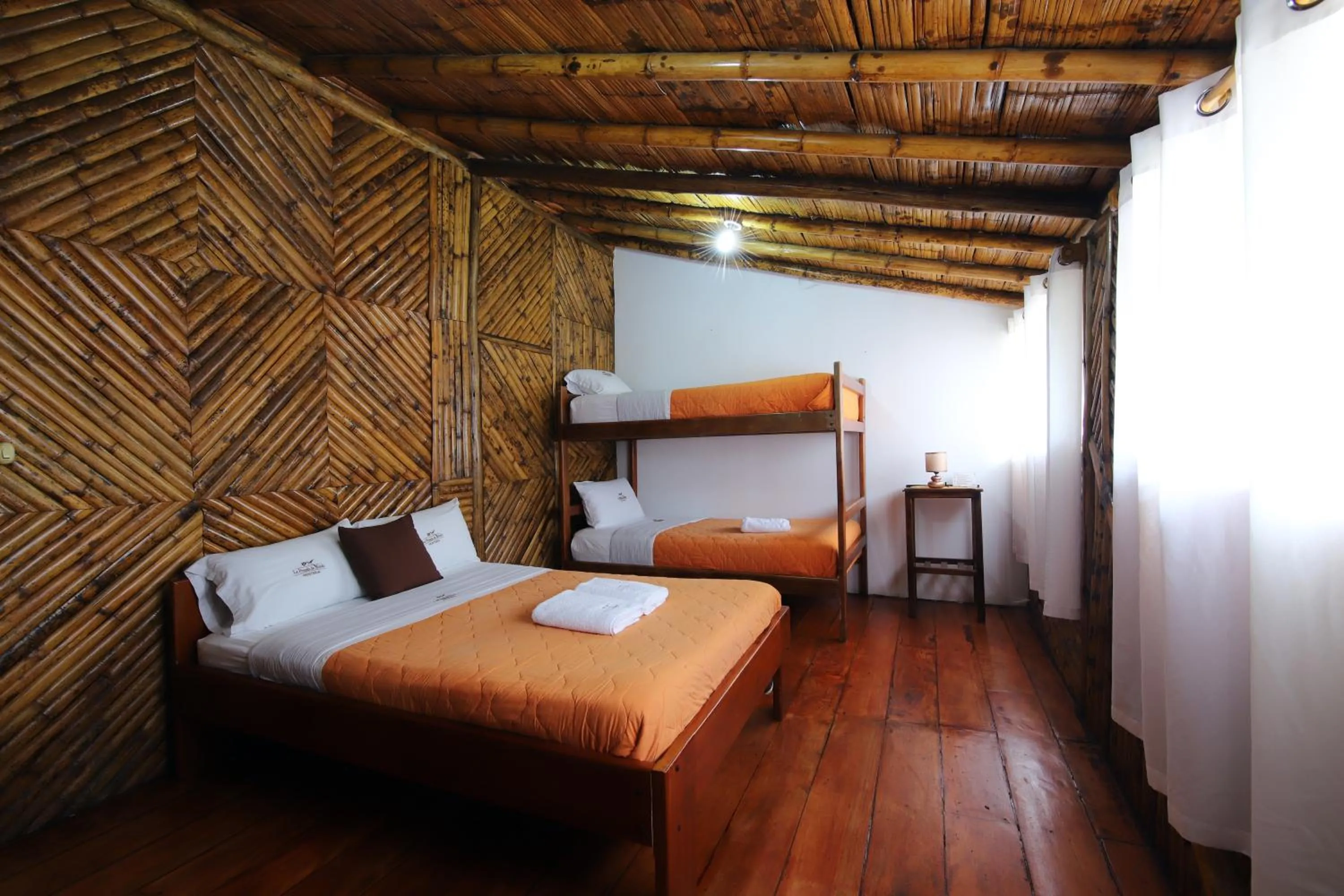 Bed in La Posada de Mindo