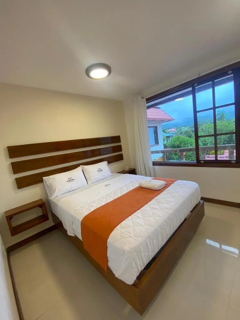 Bed in La Posada de Mindo