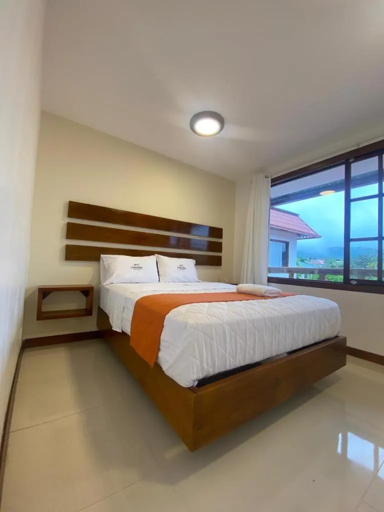 Bed in La Posada de Mindo