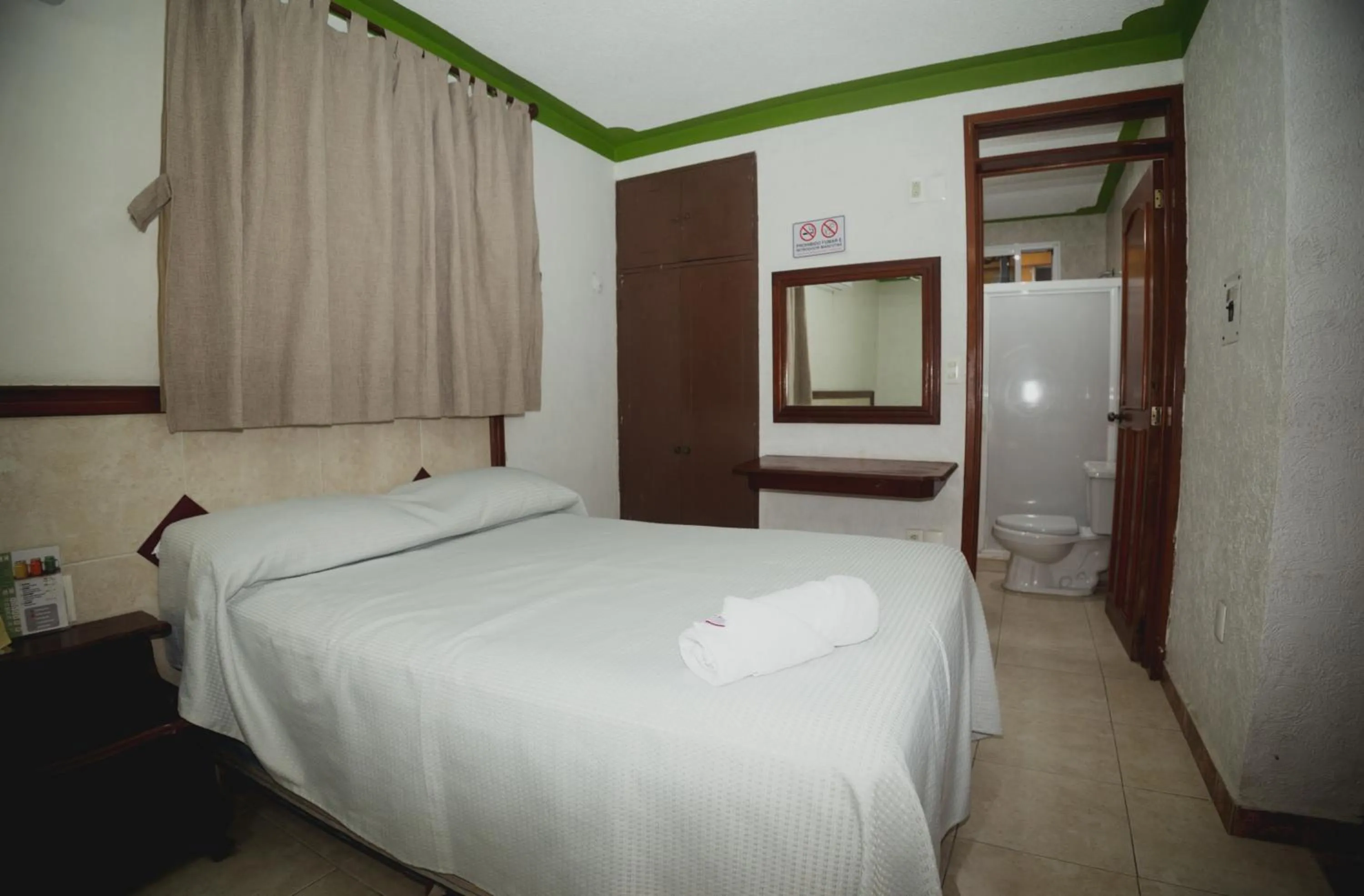 Photo of the whole room, Bed in Nicte Ha Campeche