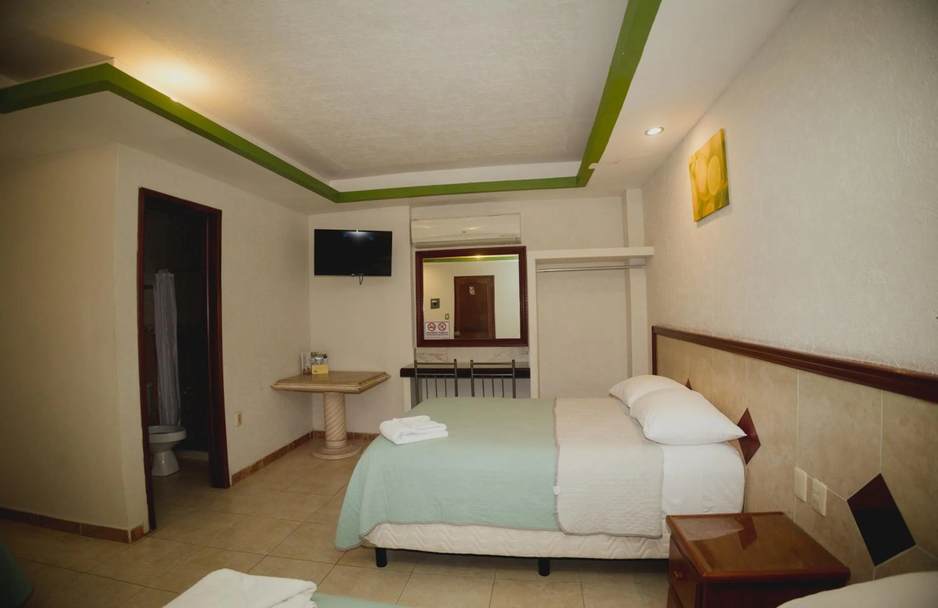 Photo of the whole room, Bed in Nicte Ha Campeche