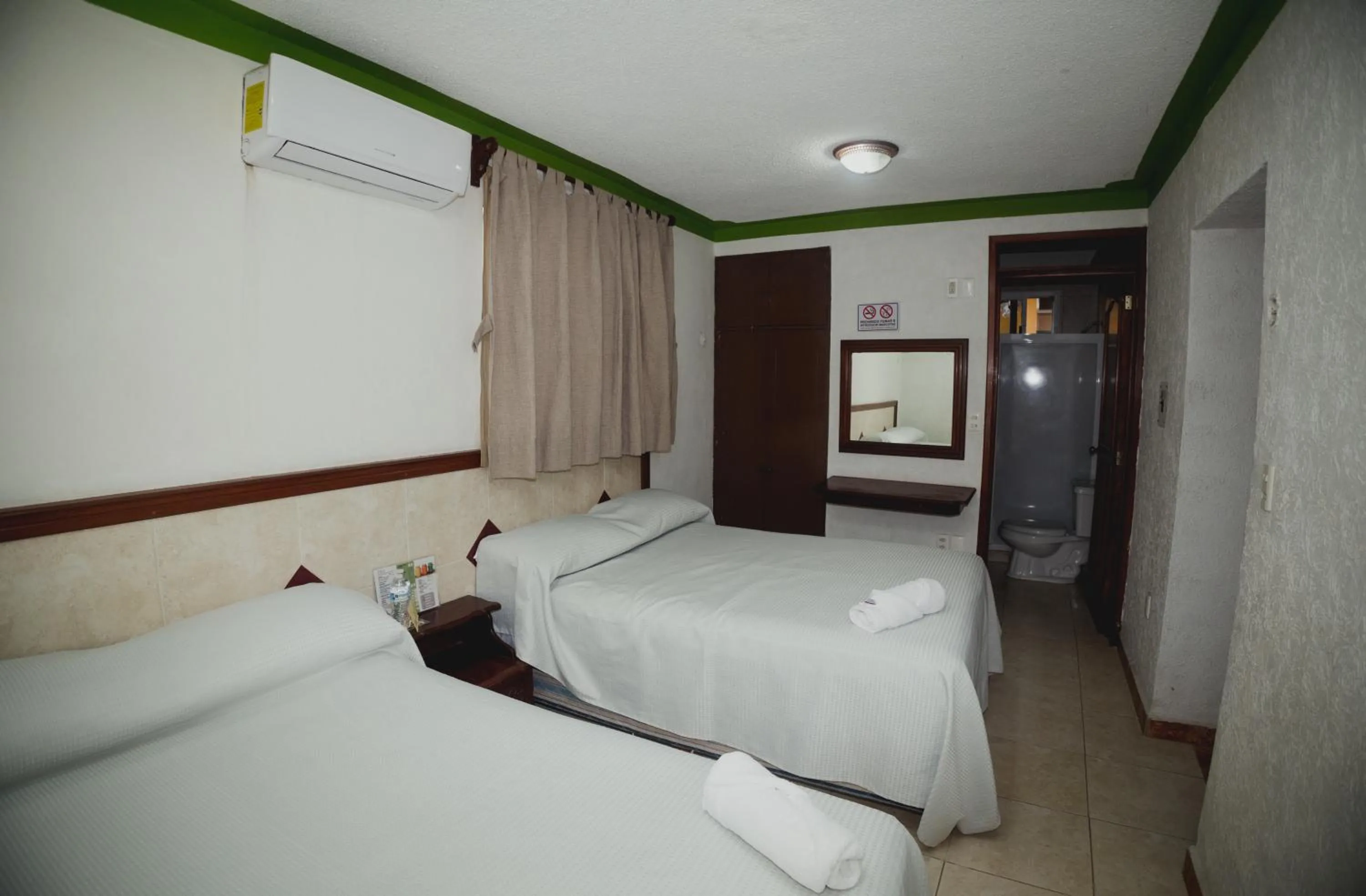 Photo of the whole room, Bed in Nicte Ha Campeche