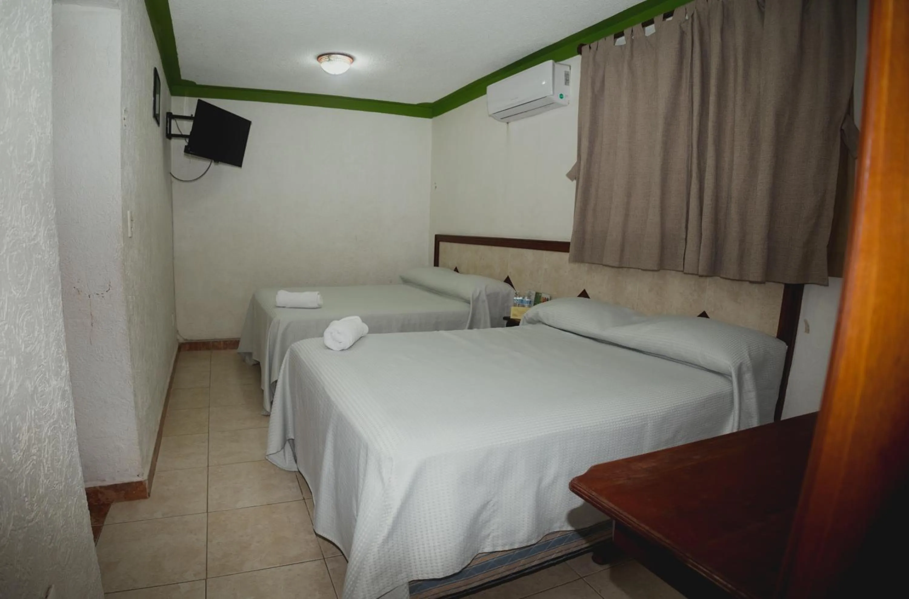 Photo of the whole room, Bed in Nicte Ha Campeche