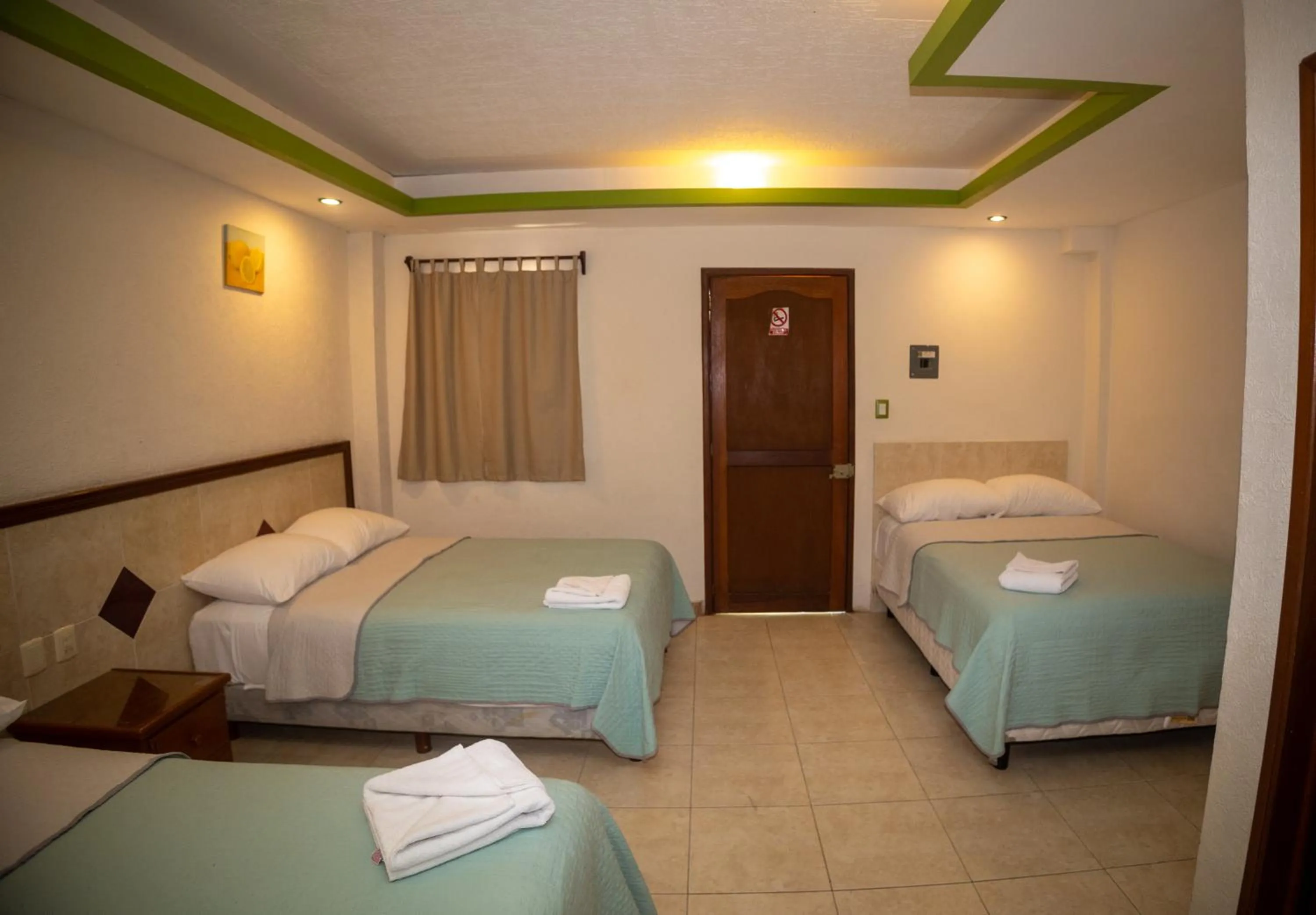 Photo of the whole room, Bed in Nicte Ha Campeche