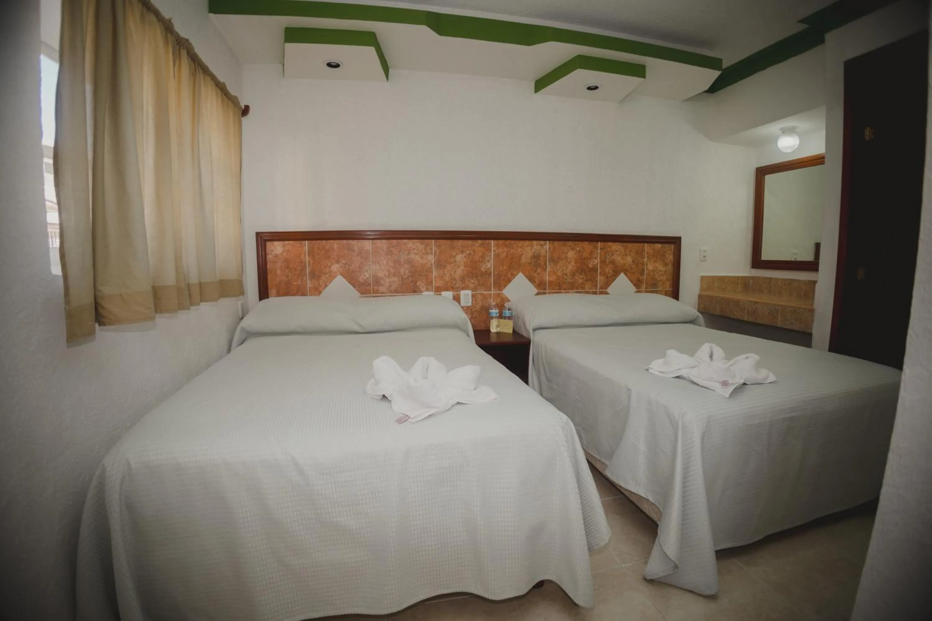 Photo of the whole room, Bed in Nicte Ha Campeche