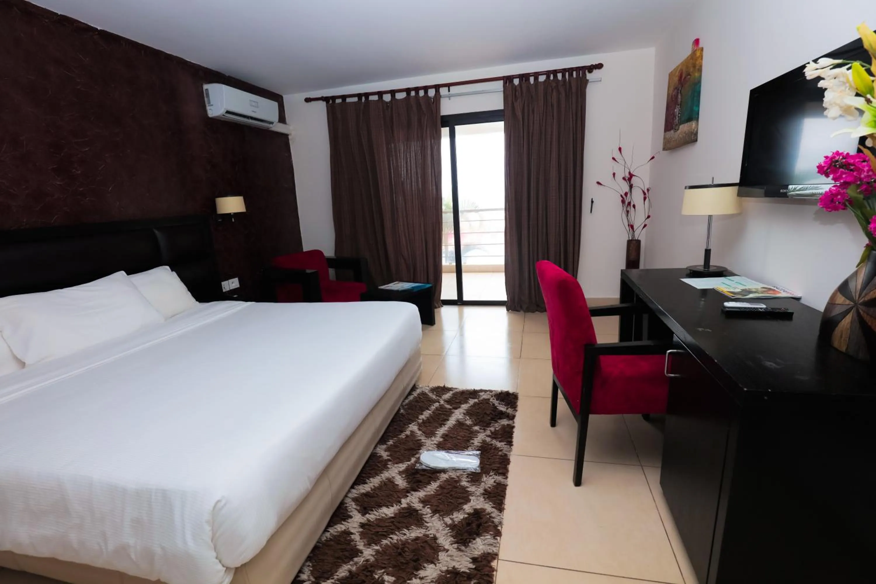 Bed in Hotel Palm Beach